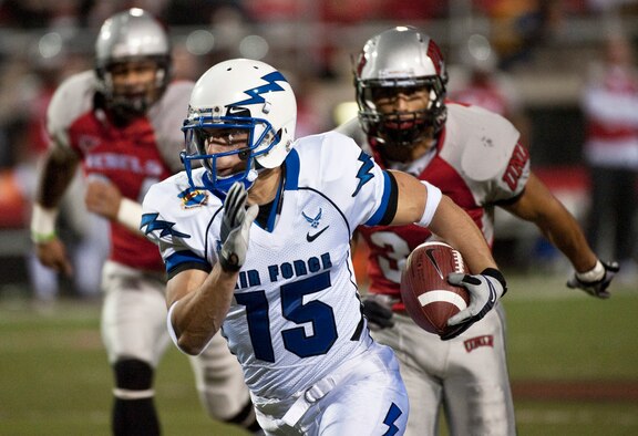 Air Force wide receiver Jonathan Warzeka runs downfield during the Falcons' final game of the season against the UNLV in Las Vegas Nov. 18, 2010. Warzeka, a native of Lake Elsinore, Calif., had two catches for 46 yards and a touchdown. The Falcons came back from a 17-7 deficit to defeat the Rebels, 35-20. (U.S. Air Force photo/Tech. Sgt. Michael R. Holzworth)