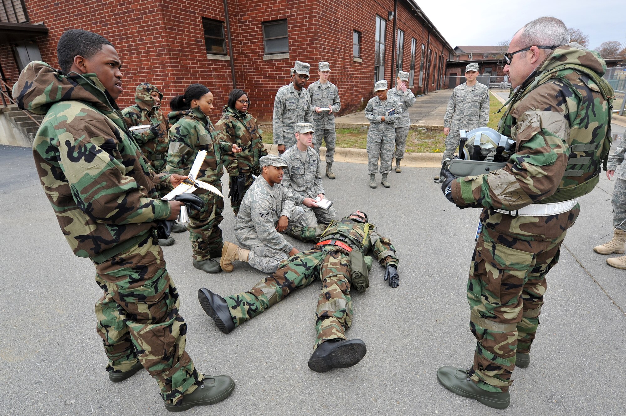 RockEx players review Self Aid Buddy Care procedures during an Ability to Survive and Operate class Nov. 18, 2010, at Little Rock Air Force Base, Ark. Members of the 19th Airlift Wing practiced different scenarios they could experience while deployed as well as tested upon during the up-coming Operational Readiness Inspection. (U.S. Air Force photo by Staff Sgt. Chris Willis)