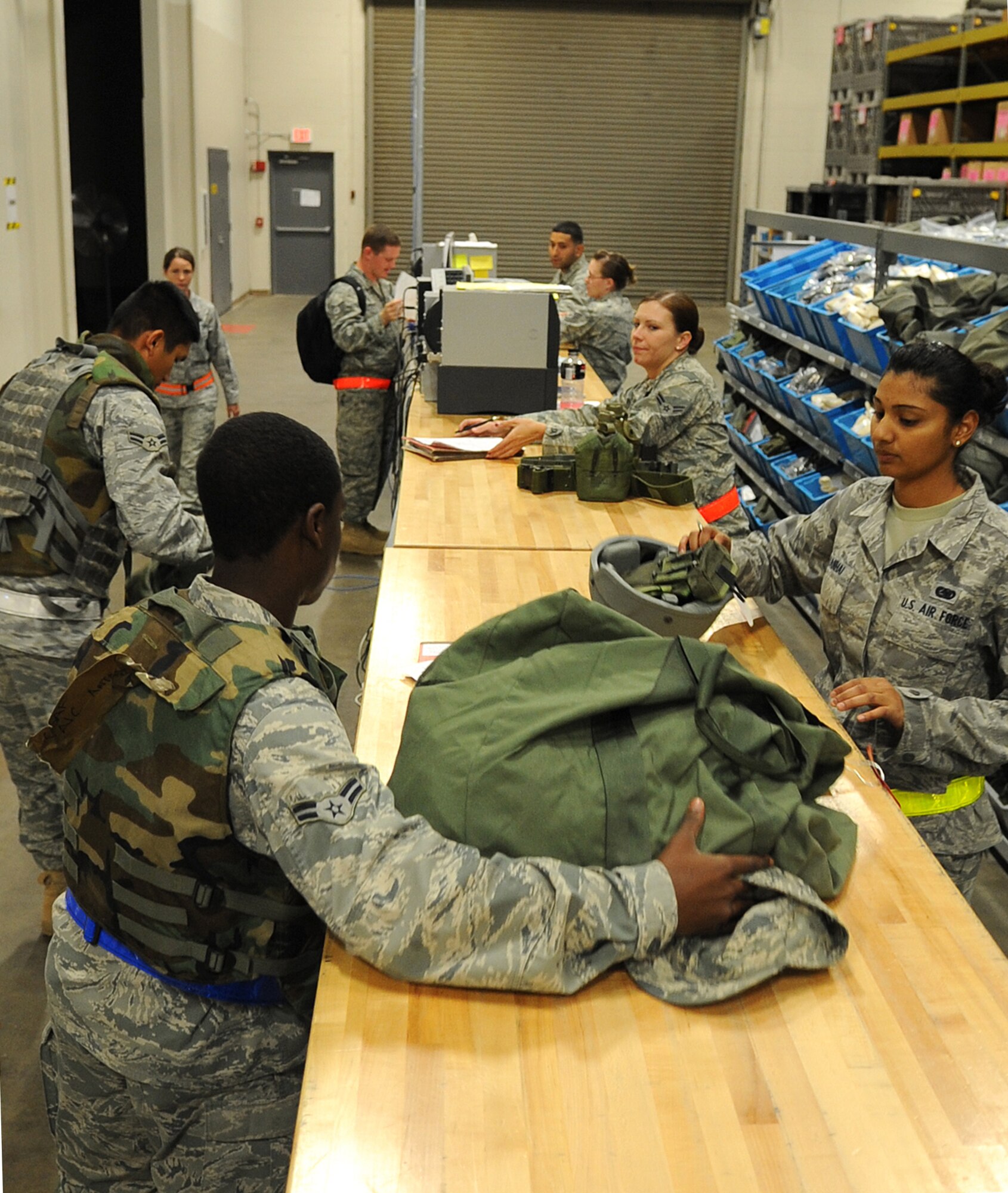 RockEx players process through the mobility line Nov. 16, 2010, at Little Rock Air Force Base, Ark. Members of the 19th Airlift Wing are preparing for the upcoming Operational Readiness Inspection by honing their skills with a base Operation’s Readiness Exercise. (U.S. Air Force photo by Staff Sgt. Chris Willis)