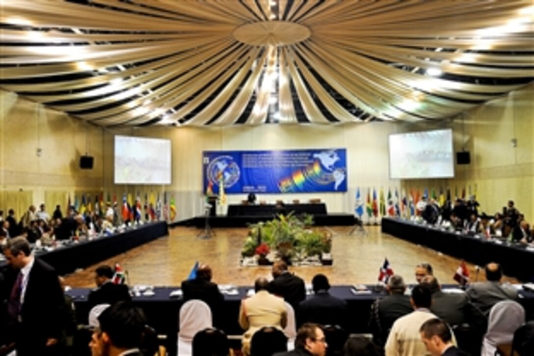 U.S. Defense Secretary Robert M. Gates and other defense ministers of the Western Hemisphere attend the first session of the ninth Conference of Defense Ministers of the Americas in Santa Cruz, Bolivia, Nov. 21, 2010.