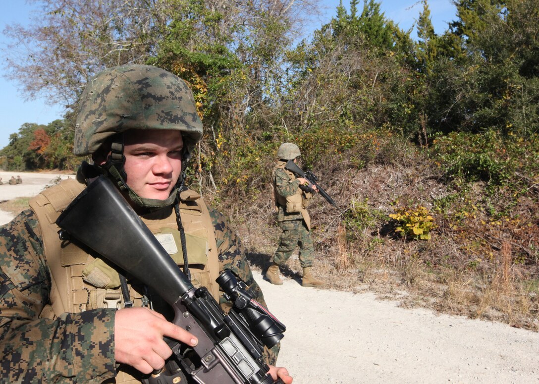 Lance Cpl. Shayne Bierly, a generator mechanic with Combat Logistics Battalion 6, Combat Logistics Regiment 2, 2nd Marine Logistics Group, conducts a patrol during a counter improvised explosive device training exercise aboard Camp Lejeune, N.C., Nov. 23, 2010. The training taught Marines the common signs of an IED and how to spot them in different scenarios. (U.S. Marine Corps photo by Pfc. Franklin E. Mercado)