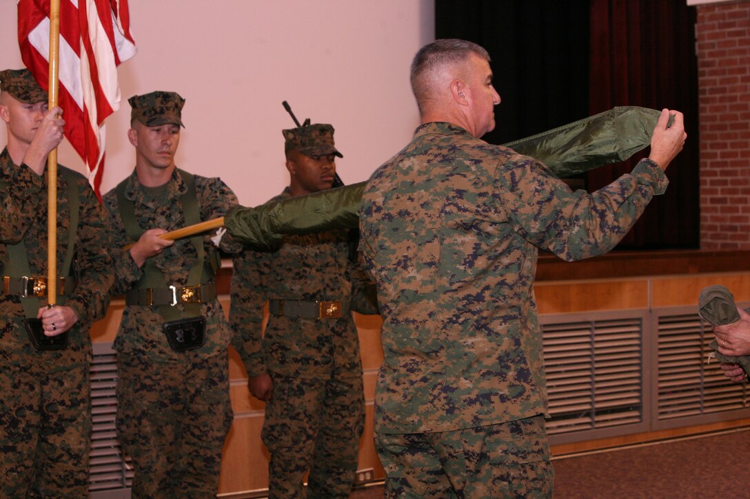 Brig. Gen. Glenn M. Walters, the commanding general of 2nd Marine Aircraft Wing (Forward), uncases the Wing's colors at an activation ceremony aboard Marine Corps Air Station Cherry Point, Nov. 23. 2nd MAW (Fwd.) activated in preparation for a 12-month deployment to Afghanistan.