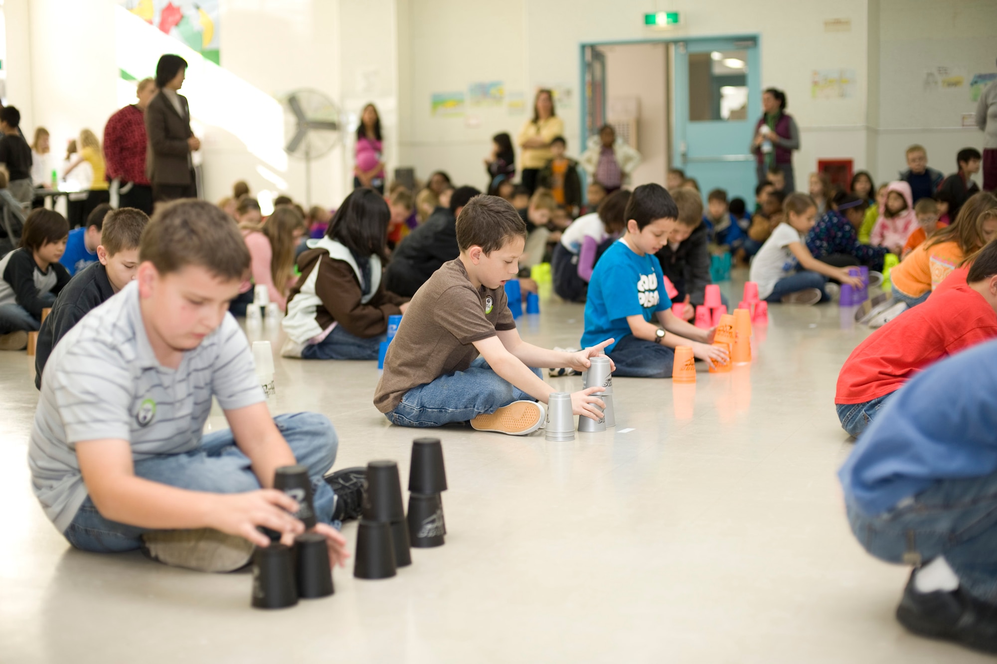 Sollars Elementary School students broke a Guinness World Record at Misawa Air Base, Japan, Nov. 18, 2010. The students took part in a worldwide sport stacking event, breaking the record for "most people sport stacking at multiple locations in one day." (U.S. Air Force photo by Airman James B. Bauer/Released)