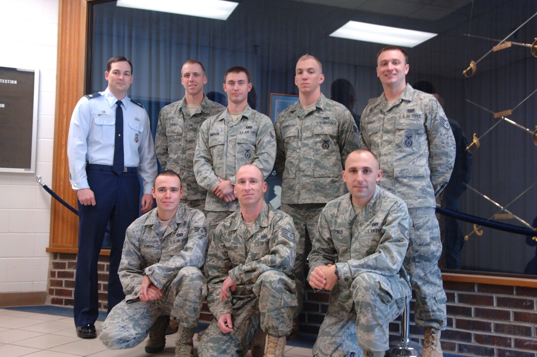 ELLSWORTH AIR FORCE BASE, S.D. – Airmen from the 28th Security Forces Squadron who competed in the Global Strike Challenge at Barksdale Air Force Base, La., stand for a picture with 28th SFS commander, Maj. Steven Ohlmeyer, Nov. 22. While the entire team earned second place within their category, Senior Airman Johnathan Byron, 28th SFS member (front row, left), brought home first place in the M4 pistol and M9 carbine combined shooter category. (U.S. Air Force photo/ Senior Airman Jarad A. Denton)