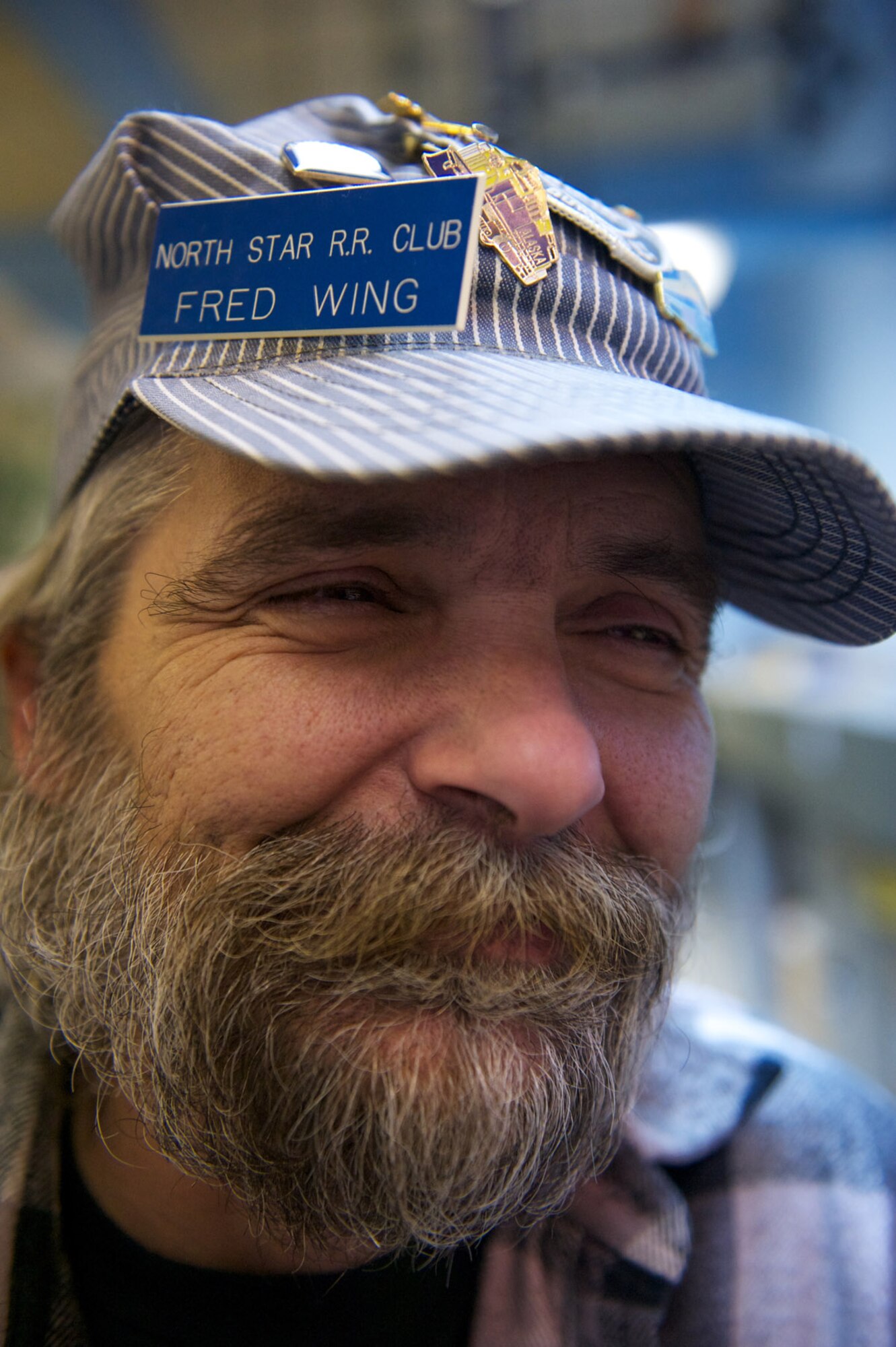 Fred Wing, North Star Railroad Club member, muses during the Nov. 20 Military Society of Model Railroad Engineers open house at Matanuska Hall. (Photo by David Bedard/JBER PAO)