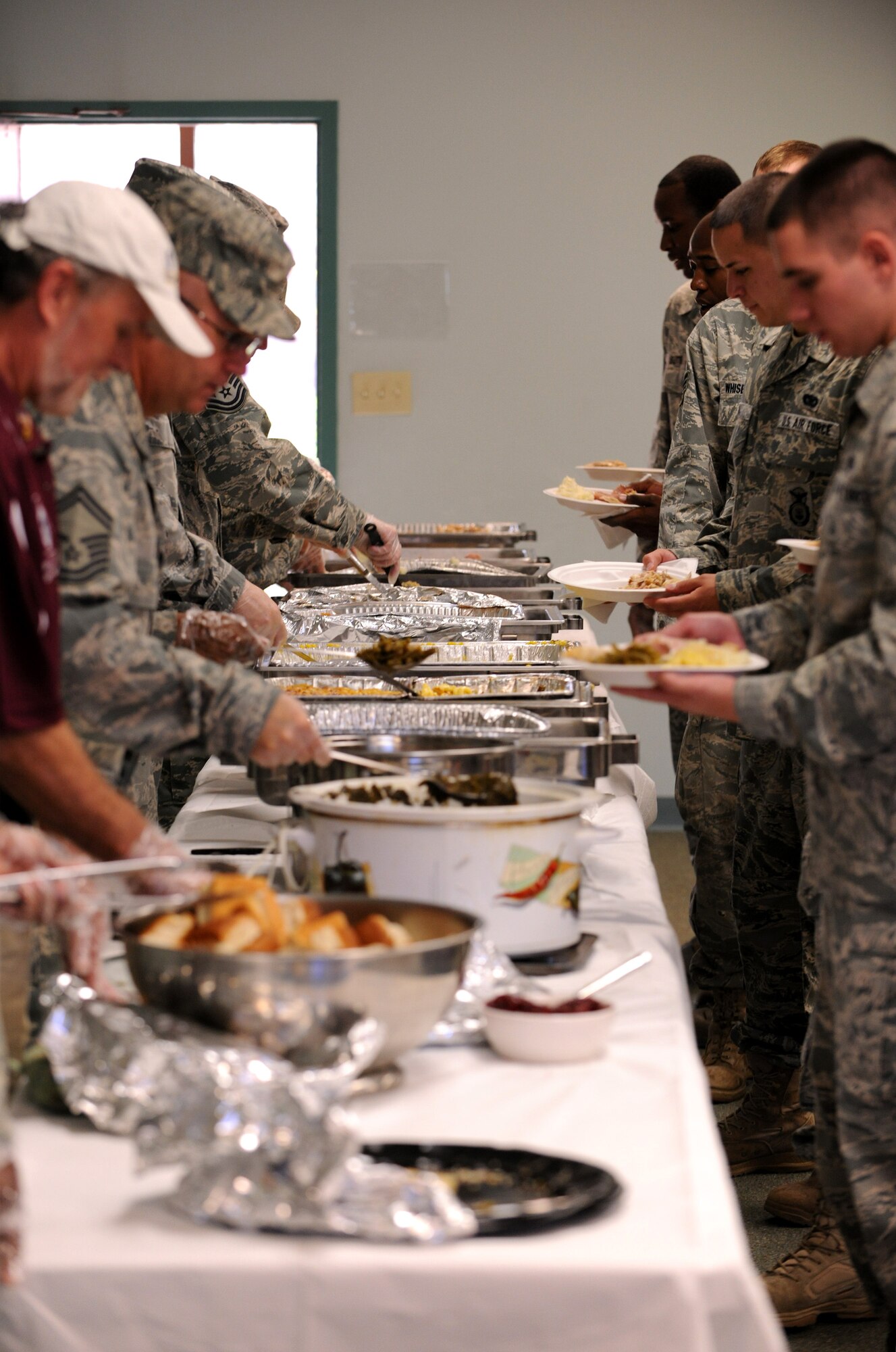 MOODY AIR FORCE BASE, Ga.-- Moody Airmen came together at the Base Chapel to enjoy a free Thanksgiving lunch Nov. 23. The food was prepared by Moody’s Top Three, the 5/6 Group, chief master sergeants and first sergeants. (U.S. Air Force photo/Airman 1st Class Benjamin Wiseman)(RELEASED)