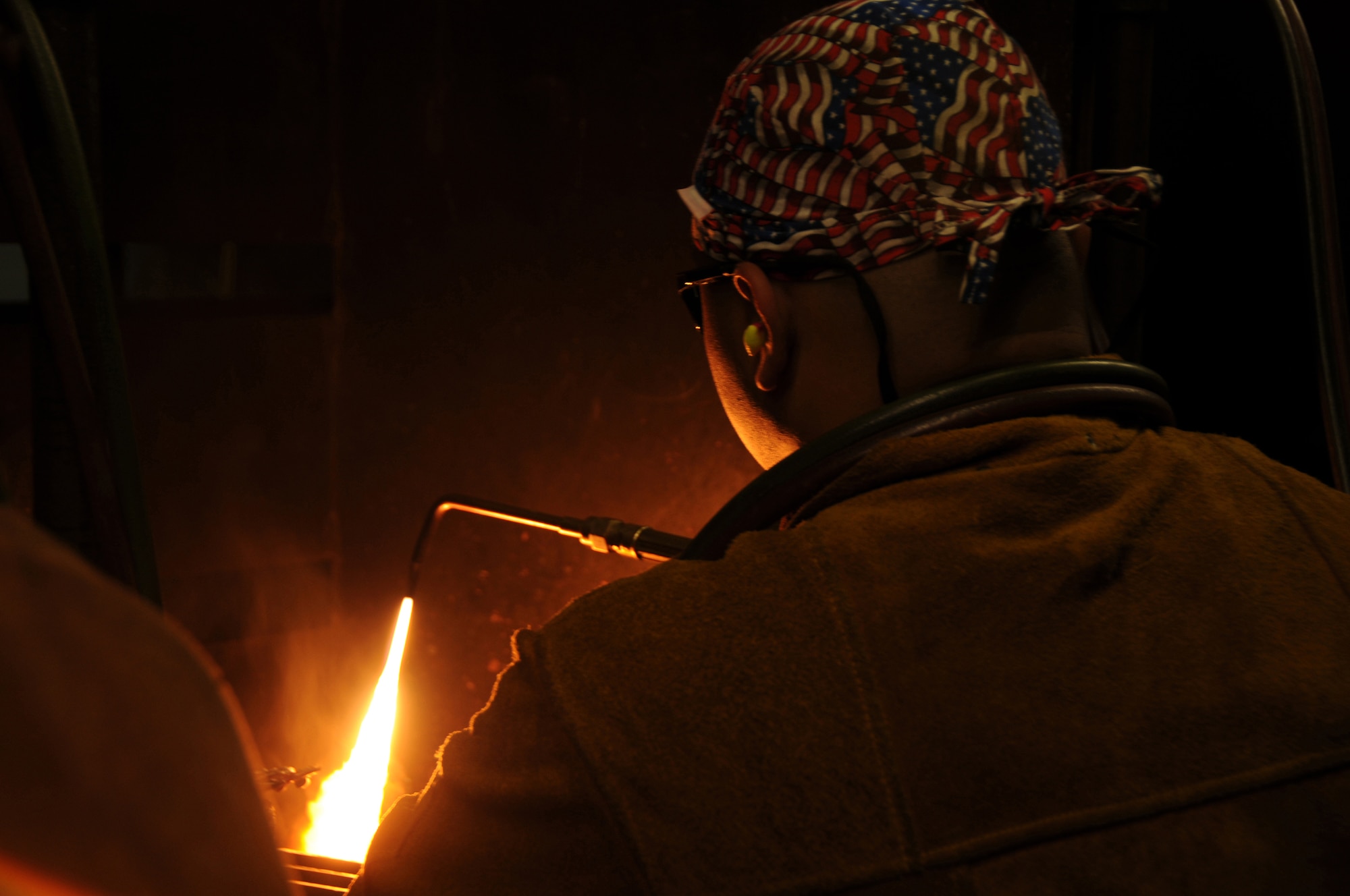 An student in the 366th Training Squadron Detachment 6 practices different types of
flames in a welding class at the Naval Construction Battalion Center in Gulfport. The
mission of the detachment, which falls under the command of the 82nd Training Wing, Sheppard Air Force Base, Texas, is to teach Airmen technical proficiency in the structures career field and integrate the Air Force’s core values into every facet of their lives. The Air Force students train with Sailors and Soldiers at the Seabee Base. (Photo by Airman 1st class Heather Holcomb)