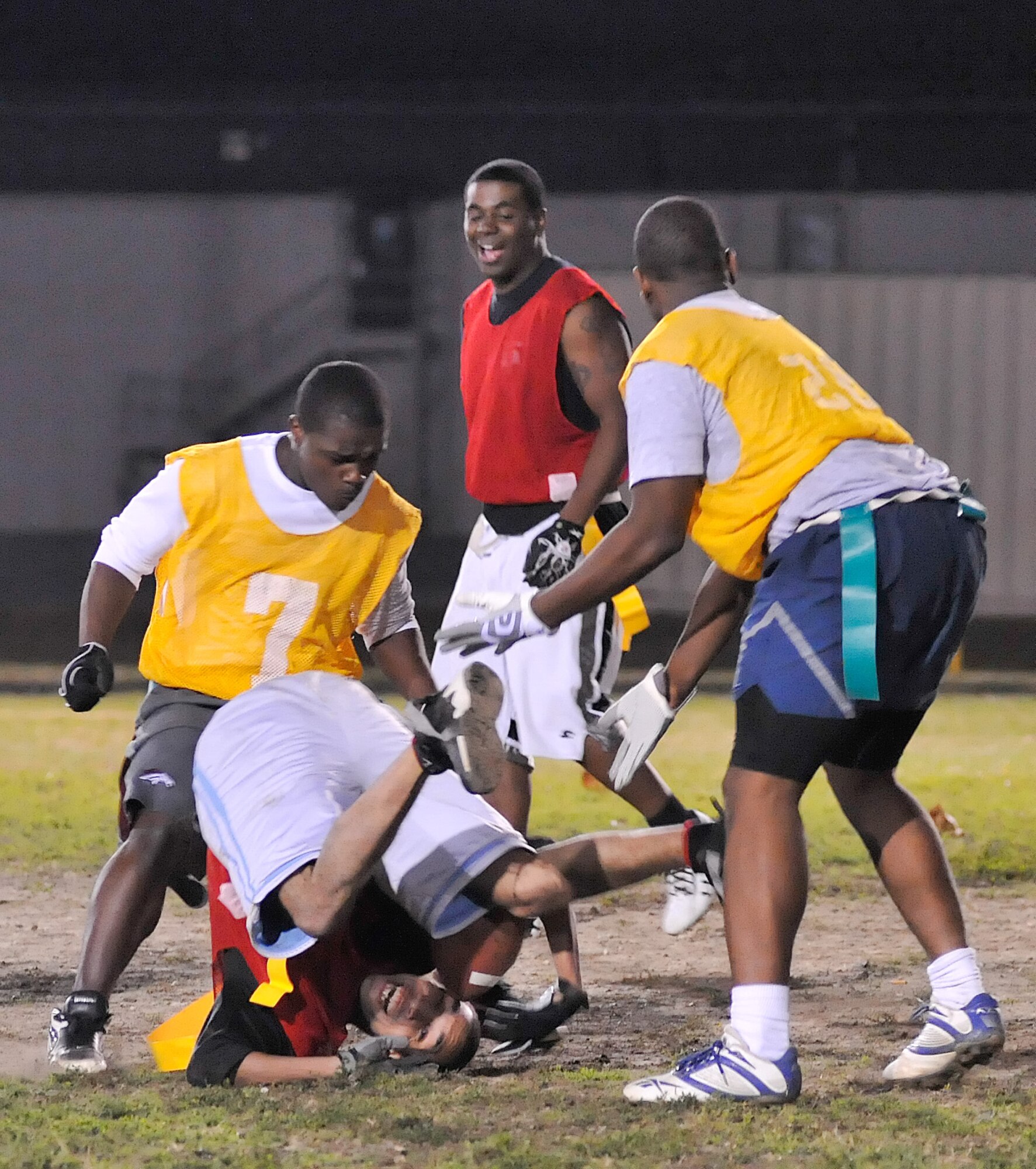 A member of the American League takes a tumble during a play during the All Star League championship game Nov. 22, 2010. (U.S. Air Force photo by Airman 1st Class Matthew Hubby/Released)