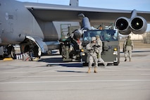 MINOT AIR FORCE BASE, N.D. -- Members of the 5th Security Forces Squadron escort a weapons convoy to the flight line as part of an Air Force Global Strike Command inspection here Nov. 4. AFGSC’s 5th Bomb Wing received a satisfactory rating after successfully completing its nuclear operational readiness inspection here Nov. 10. (U.S. Air Force photo/Senior Airman Michael J. Veloz)