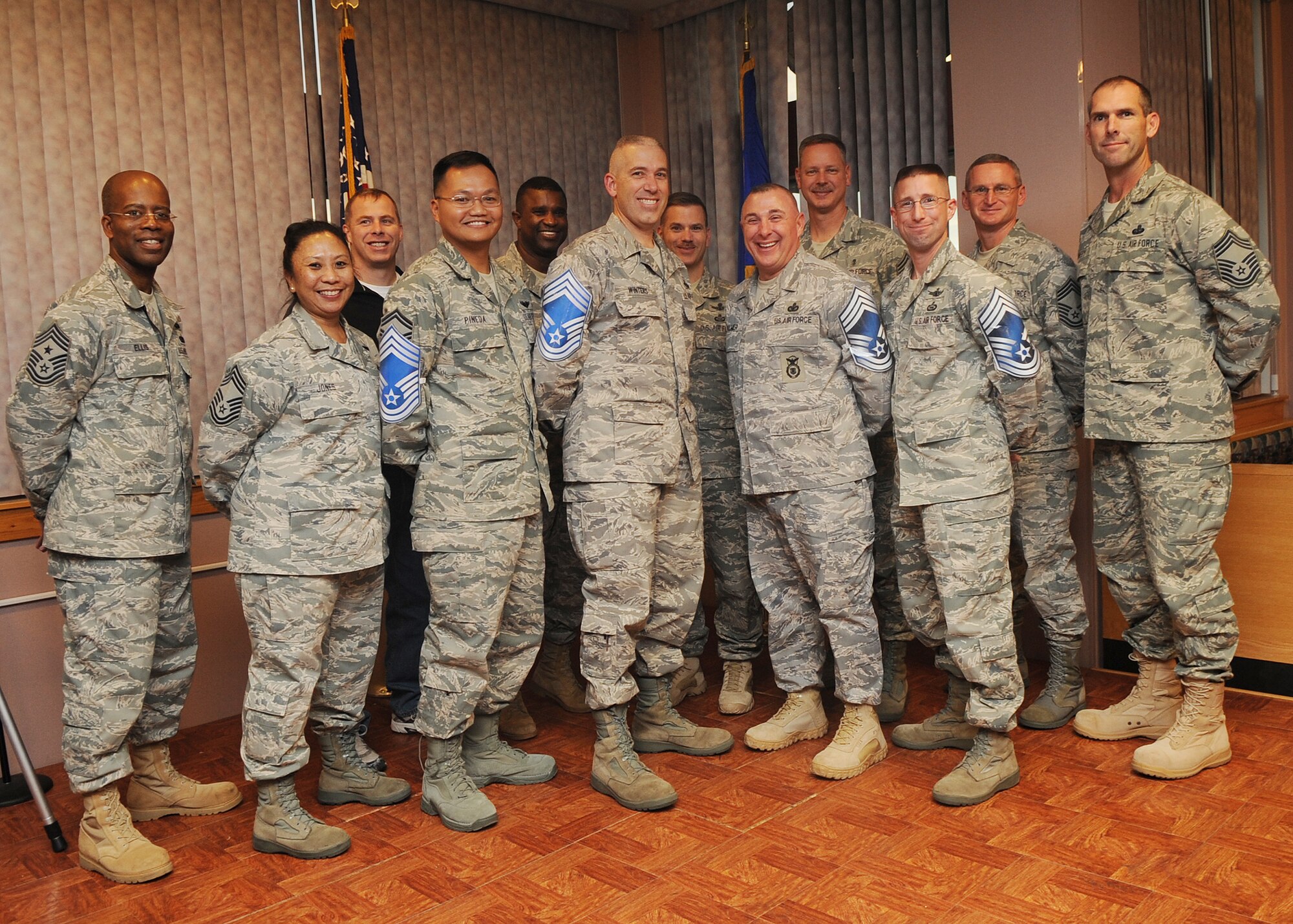 Buckley Air Force Base, Colo.-  Chiefs and Chief (Selects) pose at Newtch's Den. ( U.S. Air Force Photo by Airman 1st Class Marcy Glass )
