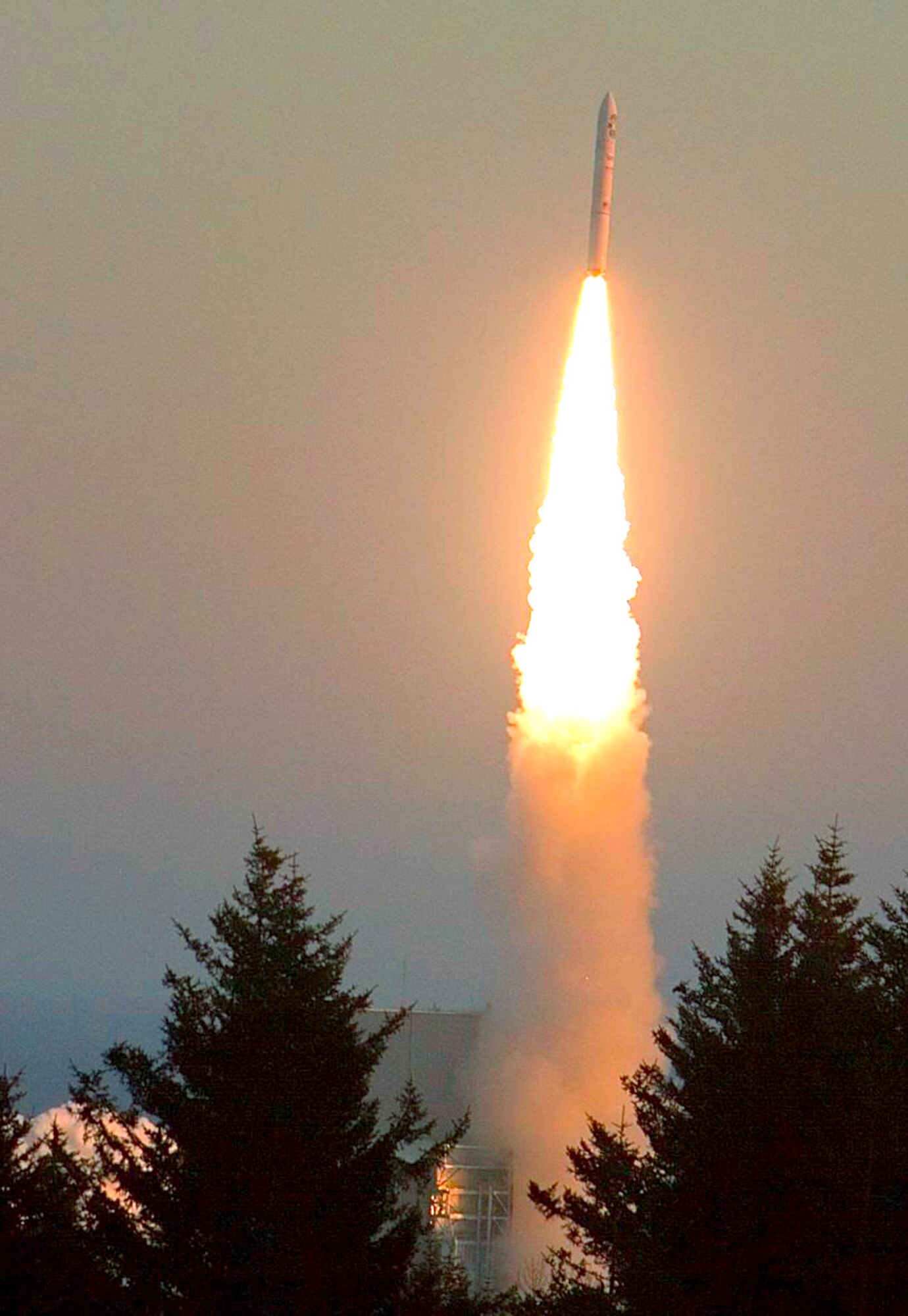 A rocket carrying the Air Force Academy's FalconSAT-5 satellite lifts off from the Kodiak Launch Complex in Alaska Nov. 19, 2010. FalconSAT is a capstone program that allows Academy cadets to design, build, test and operate a satellite. FalconSAT-5 carried Space Test Program payloads to measure measure the ionosphere and its effects on radio frequency signals. (U.S. Air Force photo/Col. Marty France)