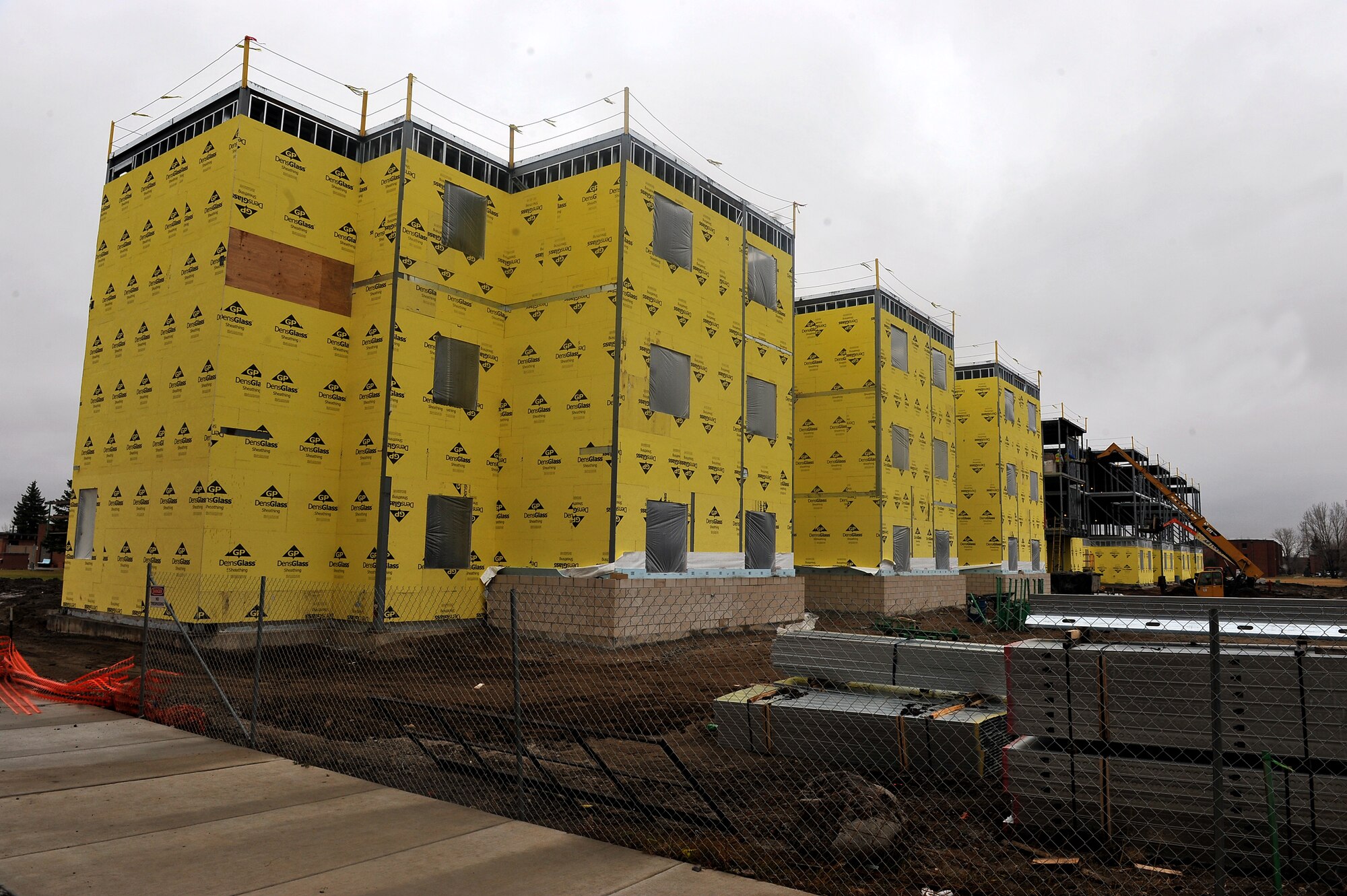 MINOT AIR FORCE BASE, N.D. -- Construction of the new dormitory is well underway in the insulation process here Nov. 10. Construction projects like this help foster a better quality of life for Air Force Global Strike Command Airmen here. (U.S. Air Force photo/Senior Airman Michael J. Veloz)