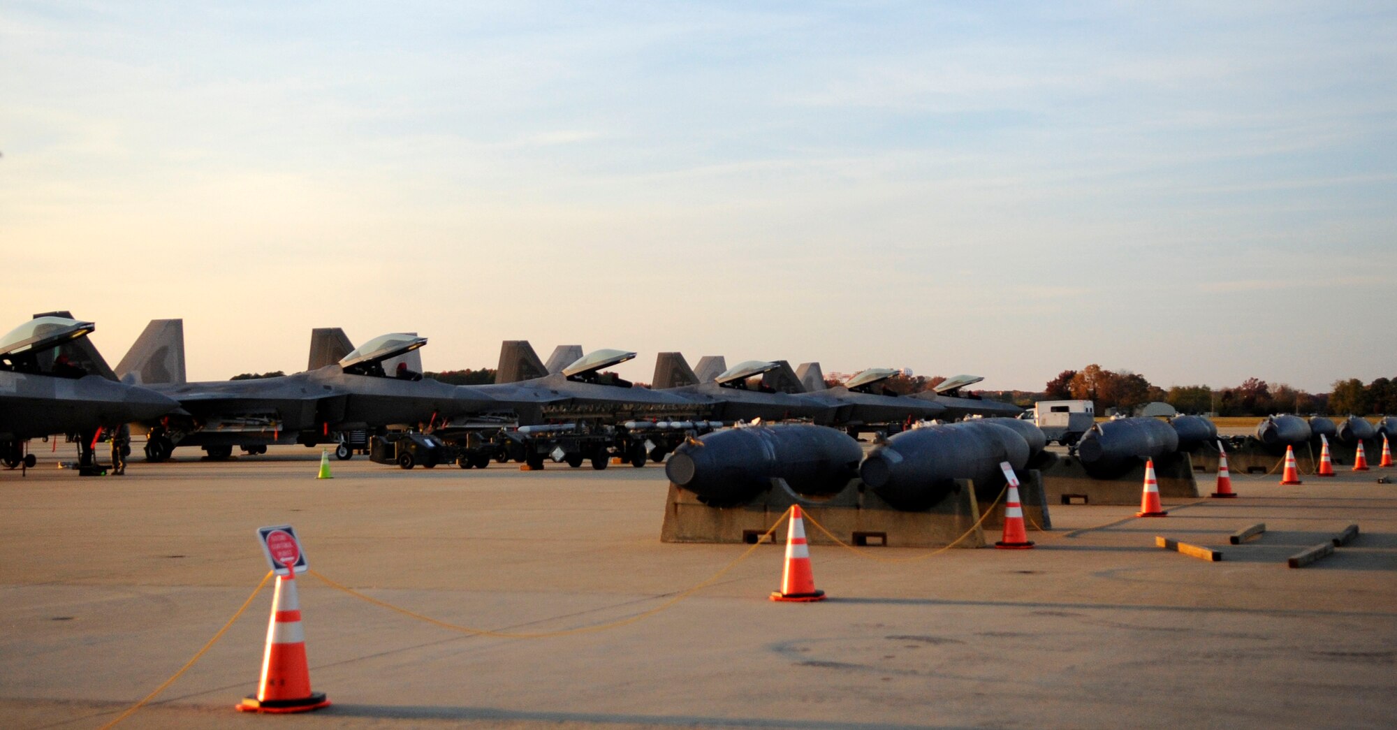LANGLEY AIR FORCE BASE, Va. – F-22 Raptors sit at Base X during a Phase I Operational Readiness Exercise Nov. 19. Wing Exercise Evaluation Team members spent two days assessing the ability of the 633d Air Base Wing, 1st Fighter Wing and 192d Fighter Wing to deploy cargo, aircraft and Airmen within a limited timeframe. (U.S. Air Force photo/Staff Sgt. Dana Hill)(RELEASED)