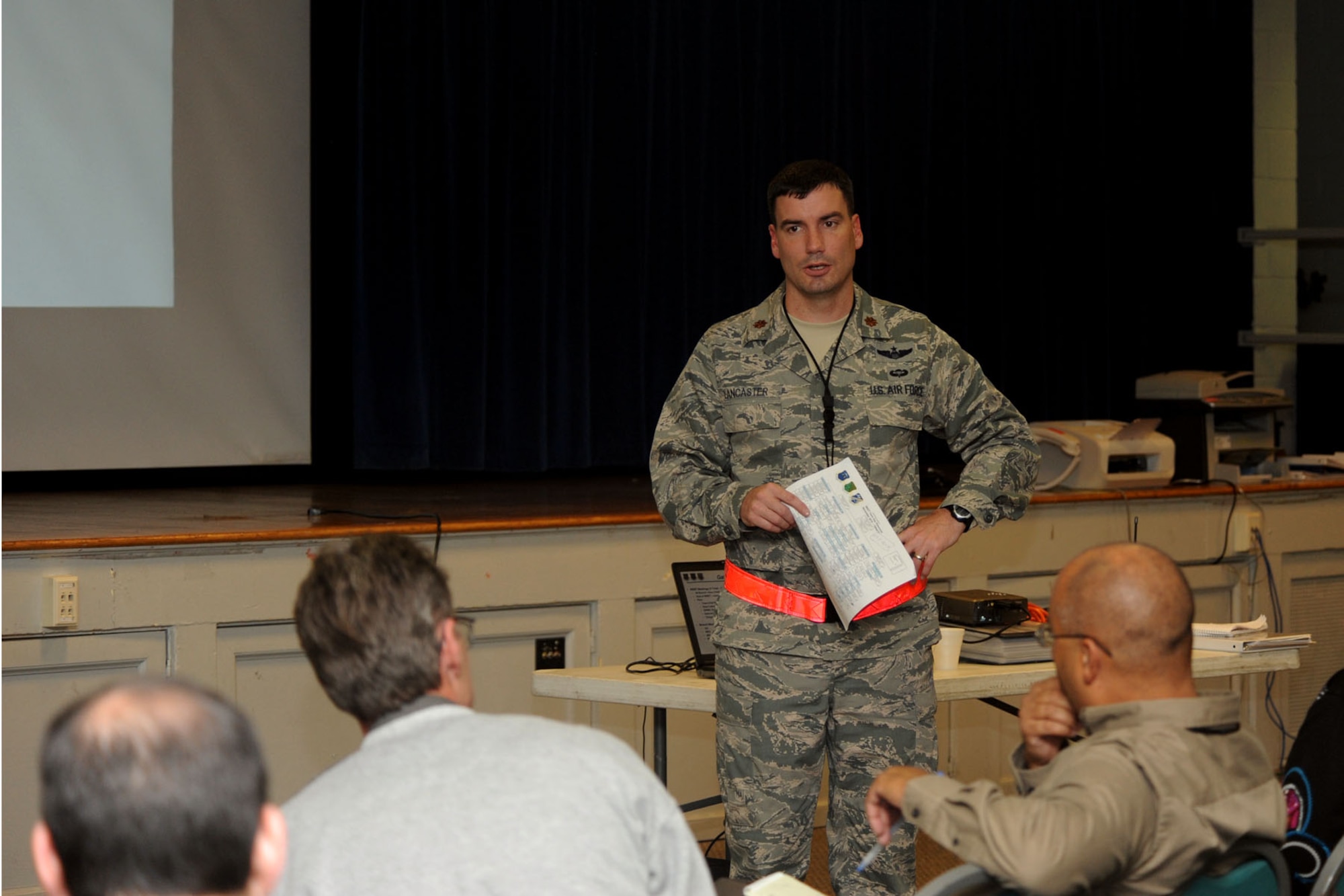 LANGLEY AIR FORCE BASE, Va. -- Maj. Philip Lancaster, Plans, Programs and Evaluations chief with 1st Fighter Wing, leads a Wing Exercise Evaluation Team briefing during a Phase I Operational Readiness Exercise Nov. 18. WEET members spent two days assessing the ability of the 633d Air Base Wing, 1st Fighter Wing and 192d Fighter Wing to deploy cargo, aircraft and Airmen within a limited timeframe. (U.S. Air Force photo/Airman 1st Class Racheal Watson)(RELEASED)