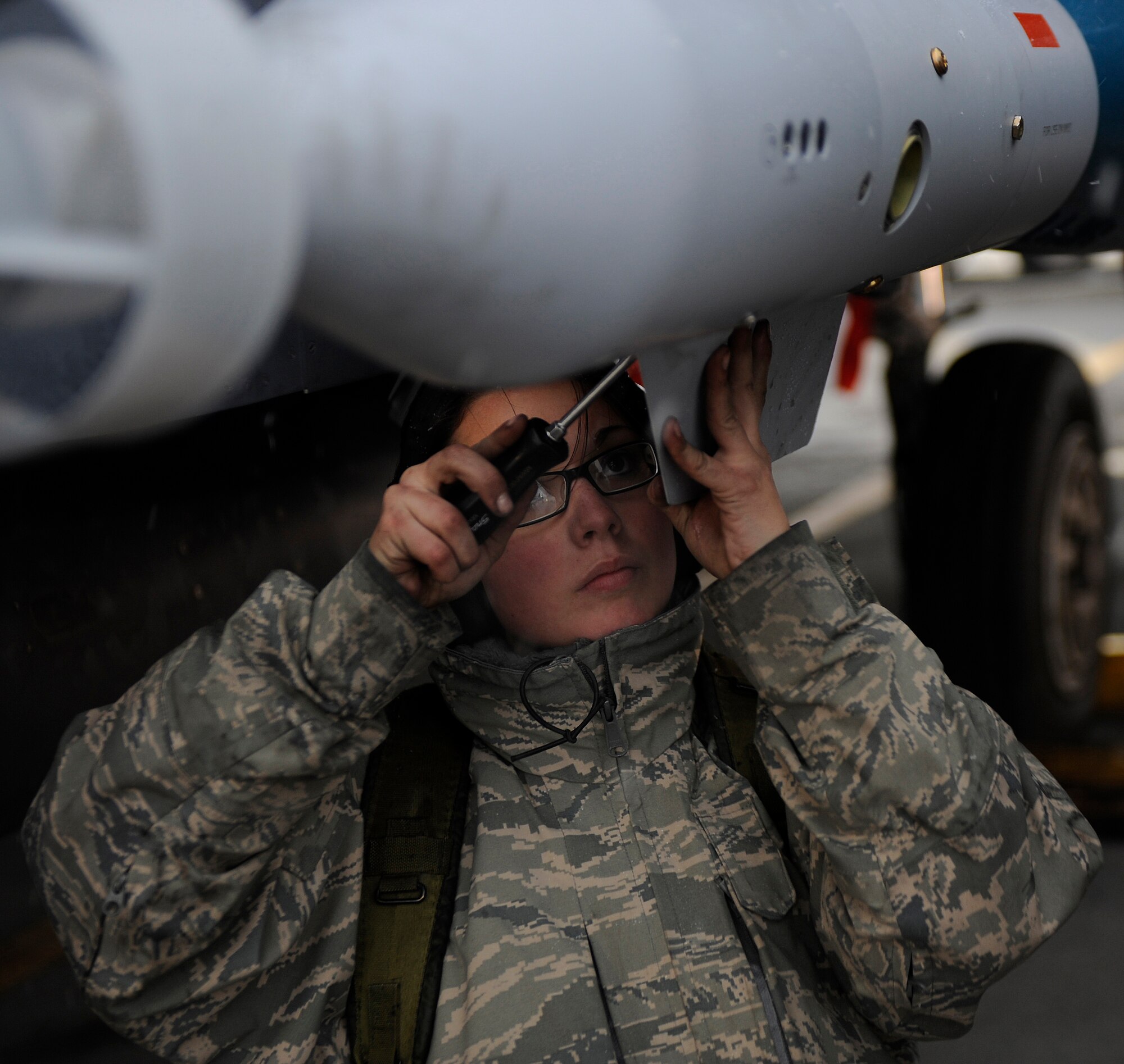 MOUNTAIN HOME AIR FORCE BASE, Idaho -- Airman 1st Class Alexandria Roope, 366th Aircraft Maintenance Squadron weapons, secures a fin on missile during a phase I operational readiness exercise Nov. 22. The wing uses OREs to gauge its ability to meet wartime taskings at a deployed location. The evaluation includes initial response, readiness, combat operations, ability to survive and operate, self aid and buddy care and mission support. (U.S. Air Force photo by Senior Airman Renishia Richardson)