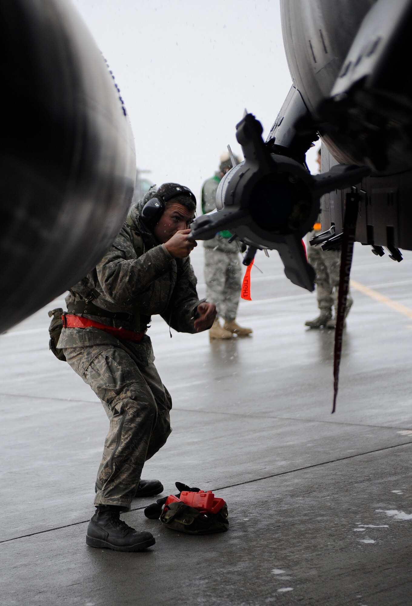 MOUNTAIN HOME AIR FORCE BASE, Idaho -- Airman 1st Class Douglas Brown, 366th Aircraft Maintenance Squadron weapons, makes sure a bomb is secure on an F-15E Strike Eagle during a phase I operational readiness exercise Nov. 22. The wing uses OREs to gauge its ability to meet wartime taskings at a deployed location. The evaluation includes initial response, readiness, combat operations, ability to survive and operate, self aid and buddy care and mission support. (U.S. Air Force photo by Senior Airman Renishia Richardson)