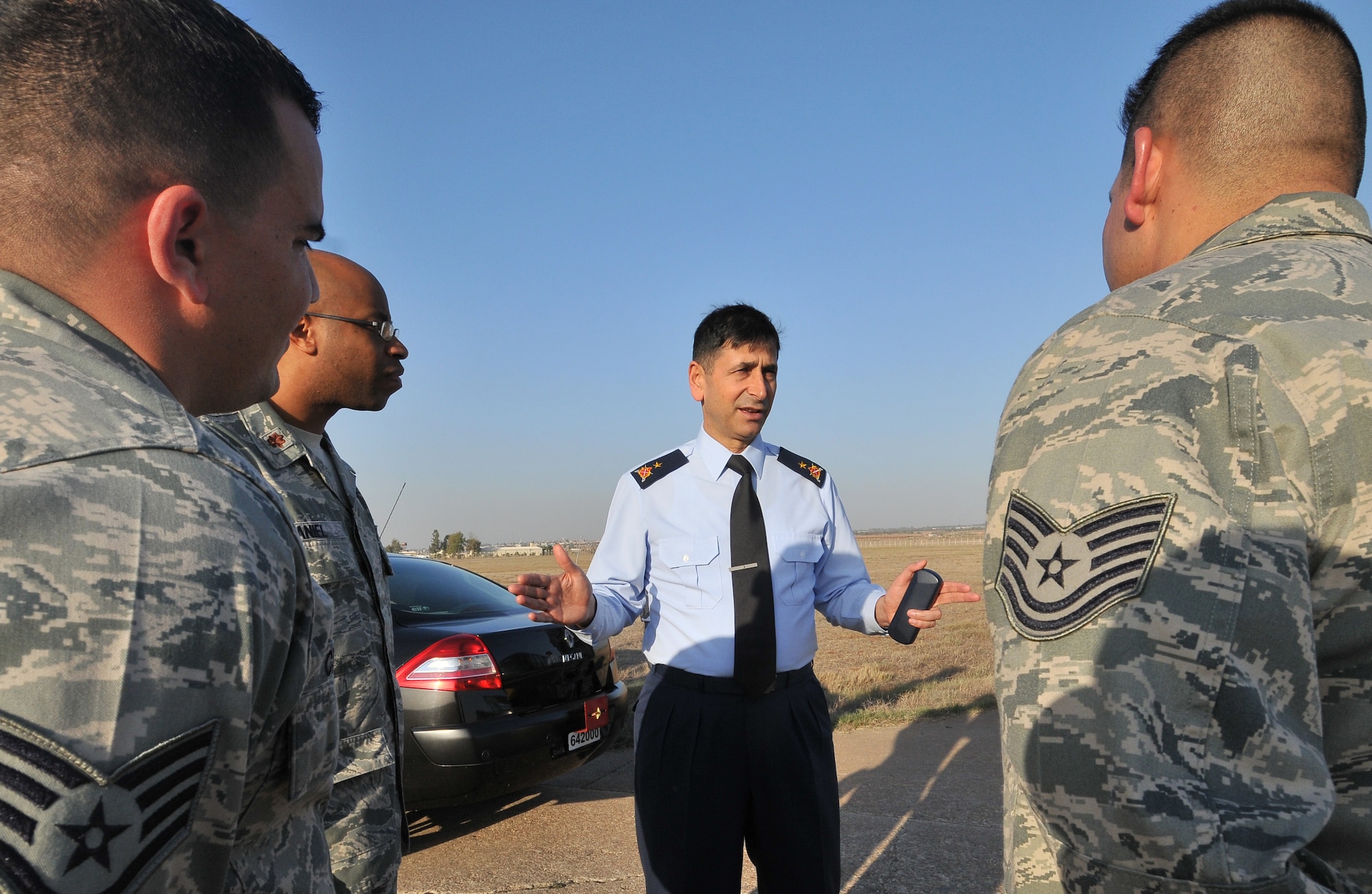 Turkish air force Brig. Gen. Mehmet Argun speaks with Airmen of the 39th Communication Squadron Nov. 12, 2010, at Incirlik Air Base, Turkey. General Argun, the Turkish air force Communications Branch commander, visited Incirlik to gain insight into the ways the 39th CS and the Turkish Communication Squadron accomplish their mission. (U.S. Air Force photo by Senior Airman Alexandre Montes/Released)