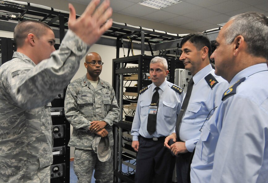 Turkish air force Brig. Gen. Mehmet Argun speaks with Airmen of the 39th Communication Squadron Nov. 12, 2010, at Incirlik Air Base, Turkey. General Argun, the Turkish air force Communications Branch commander, visited Incirlik to gain insight into the ways the 39th CS and the Turkish Communication Squadron accomplish their mission. (U.S. Air Force photo by Senior Airman Alexandre Montes/Released)