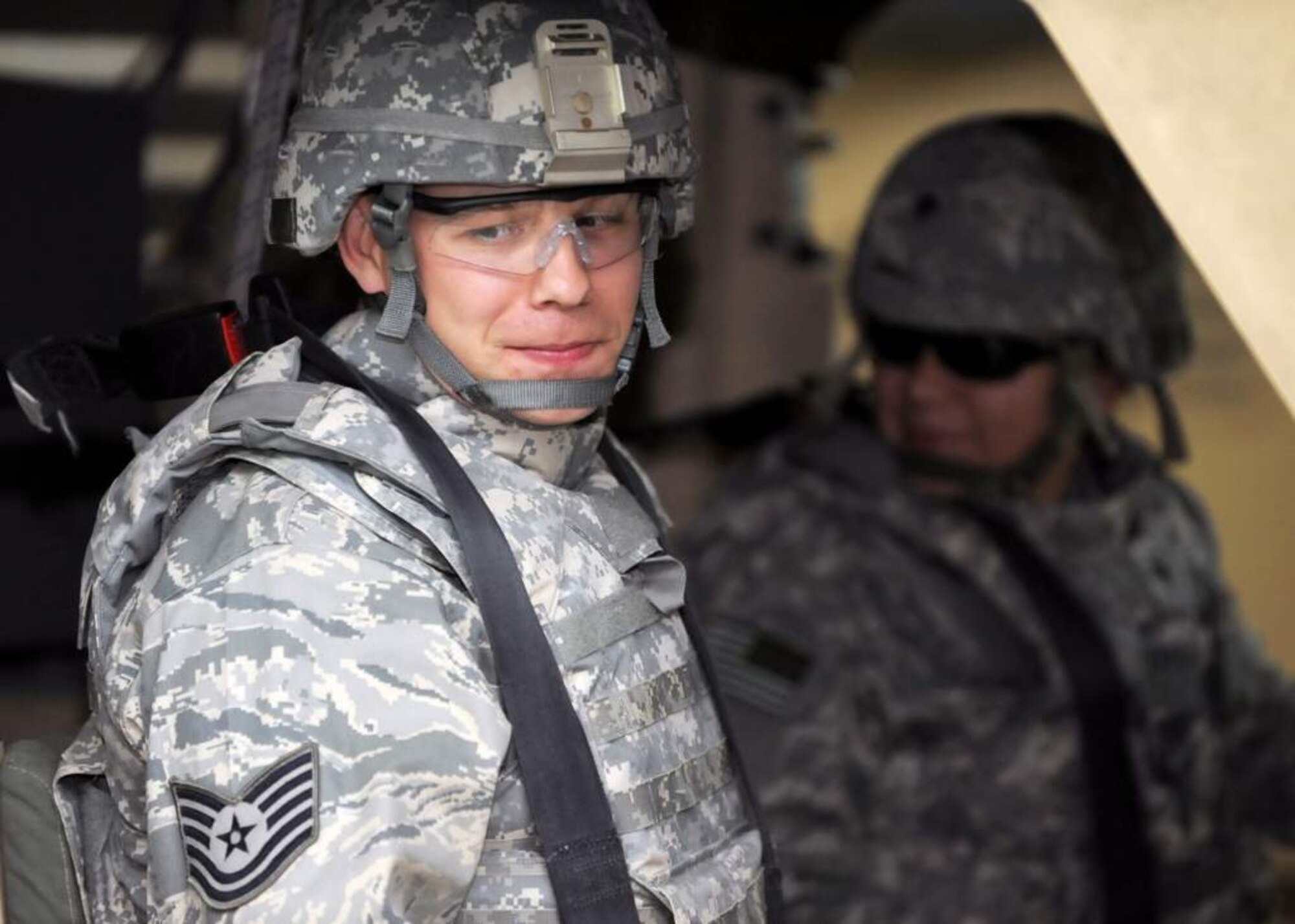 Tech. Sgt. Robert McVickers, an Airman deploying to Iraq, prepares to go through Mine Resistant Ambush Protected vehicle training with the 467th Air Expeditionary Group at an undisclosed air base in Southwest Asia Nov. 16, 2010. With the activation of the 467th AEG, Nov. 12, the group commander now has full administrative and operational control over Individual Augmentee, or IA, Airmen along with the joint expeditionary tasked, or JET, Airmen they already had ADCON and OPCON of in the Iraq Joint Operations Area. (U.S. Air Force photo by Senior Airman Laura Turner / Released)