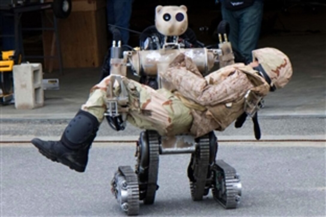 An all-terrain, search-and-rescue humanoid robot simulates how a soldier or item up to 500 pounds can be lifted and carried, and how it can grasp fragile objects without damaging them at Fort Detrick, Md., Nov. 22, 2010.