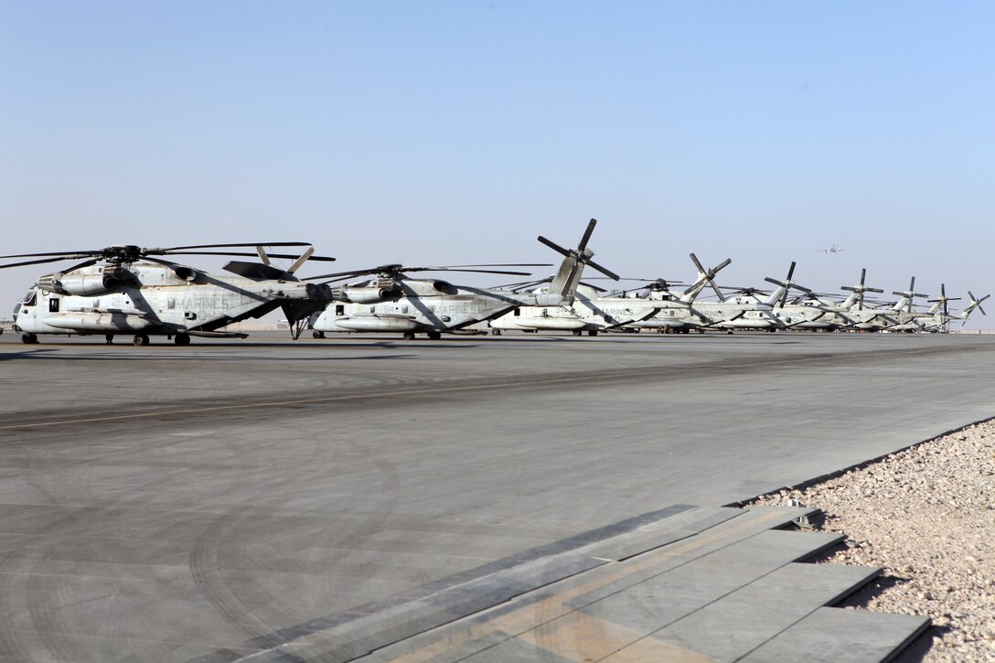 CH-53E Super Stallions with Marine Heavy Helicopter Squadron 361 (-) (Reinforced) line the flightline here ready to support International Security Assistance Forces operations within the region.  Being the only CH-53E squadron with 3rd Marine Aircraft Wing (Forward), the squadron was reinforced with additional manpower from HMH-466.  Together, under the HMH-361 (-) (Rein) flag, the squadron’s 17 aircraft have transported more than 4.5 million pounds of cargo, 26,000 personnel and flown more than 3,100 flight hours since they arrived here Aug. 1.