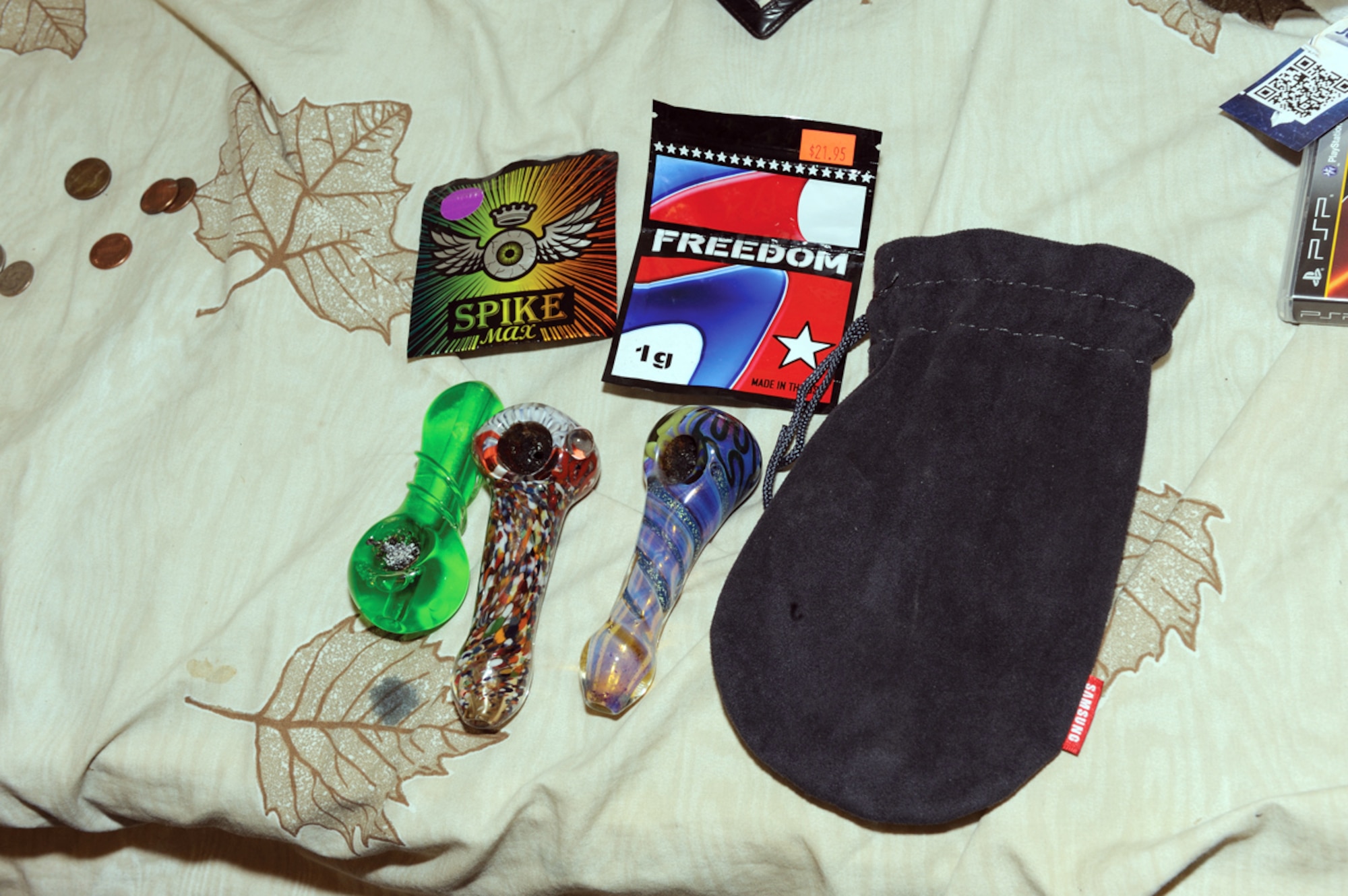 A collection of Spice - synthetic marijuana - packets, pipes for smoking the substance and a pouch for concealing and carrying the contraband. Any intoxicating substance not intended for human ingestion and the use of substances contrary to the directions of the manufacturer or prescribing health-care provider are banned for service members. (Courtesy photo)