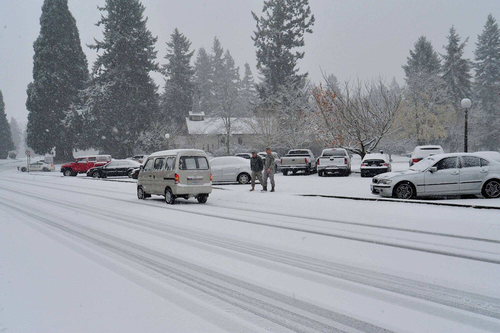 Building 100 experienced its first snowfall of the season Nov. 22 when more than two inches of snow collected on McChord Field, Joint Base Lewis-McChord, Wash. (U.S. Air Force photo/Adamarie Lewis-Page)