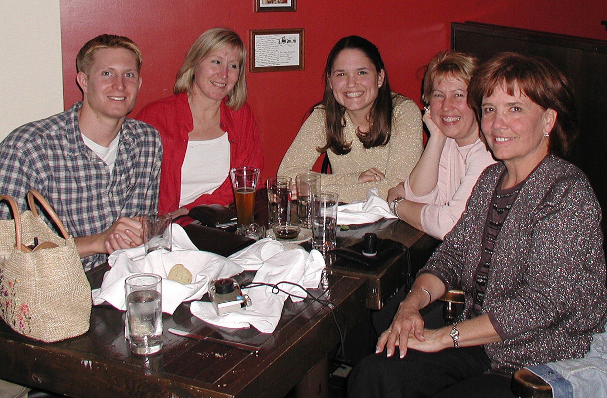 (Left to right) Capt. Reagan Beaton, his mother, Sarah Baxter, his wife, Sierra Beaton, his friend, Virginia Thomas, and his mother-in-law, Kathy Bachtel pose for a picture in March 2002. Virginia passed away two years later of cancer; Captain Beaton continues to honor Virginia by donating to cancer research through the Combined Federal Campaign. (Courtesy photo)
