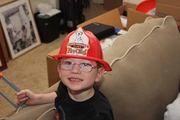 Four-year-old Benjamin, son of Julie and Maj. Joseph Babboni, 11th Bomb Squadron assistant director of operations, is developmentally delayed and the family is receiving support from Barksdale Airmen and the local community to improve his quality of life. An organization called 4 Paws is assisting the family to give them a trained dog that will be trained specifically for them and will know how to find Benjamin if he loses track of his family. The dog will walk with a tether, which is a type of lead and harness Benjamin wears so he can walk freely out of his parents’ reach. The dog will also know how to disrupt certain behaviors. This means the dog is cued to keep Benjamin from dangerous situations, such as standing between the child and a hot stove. (Courtesy photo)