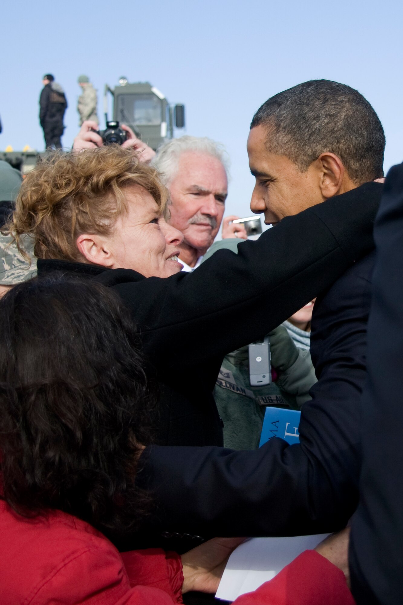 GRISSOM AIR RESERVE BASE, Ind. -- Sue Correll, a contracting specialist with the 434th Logistics Readiness Squadron, hugs President Barack Obama during his visit to the area. President Obama stopped to greet the crowd after landing at Grissom Nov. 23 before leaving for nearby Kokomo, Ind. Both President Obama and Vice President Joe Biden were in the area to discuss the economy. (U.S. Air Force photo/Tech. Sgt. Mark R. W. Orders-Woempner) 