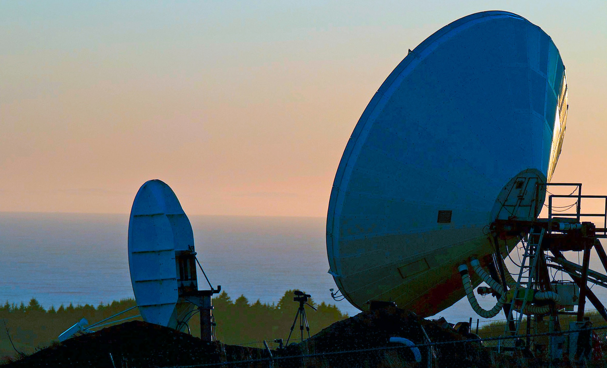 A satellite dish at the Kodiak Launch Complex in Alaska reflects light from a sunset Nov. 19, 2010, prior to liftoff of a rocket carrying the Air Force Academy's FalconSAT-5 at the complex. (U.S. Air Force photo/Col. Marty France)