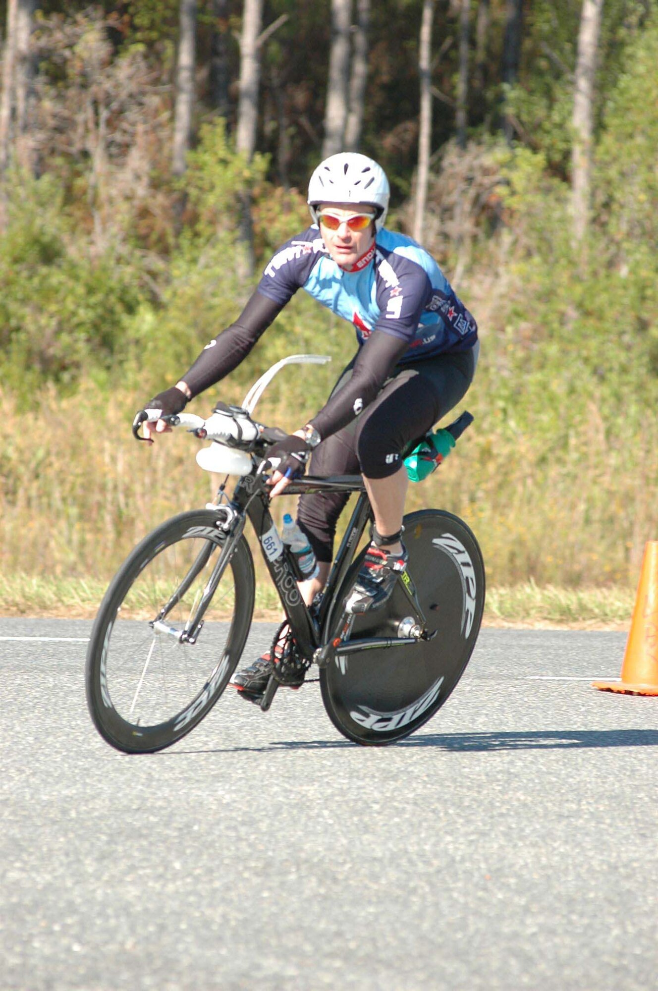 Roberts lets the rubber hit the road during the 112-mile cycling leg of the Ironman Florida traithlon Nov. 6. Having finished a 2.4-mile swim, Roberts has a full marathon
awaiting him after he dismounts his bike. (courtesy photo)