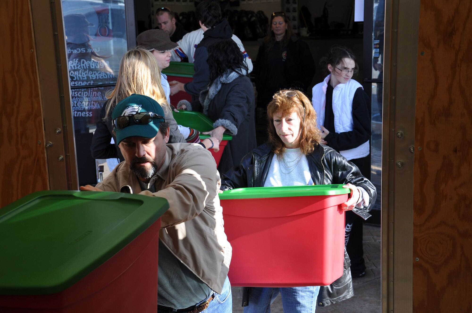 JOINT BASE MCGUIRE-DIX-LAKEHURST, N.J. -- Parents and students of The Karate Dojo located in Jackson, N.J., load more than 40 turkey meals onto a truck for delivery to the local Air Force Reserve unit. For the past three years the students have raised money to purchase all the makings for a complete Thanksgiving Day meal to donate to Airmen serving with the 514th Air Mobility Wing at Joint Base McGuire-Dix-Lakehurst, N.J. (U.S. Air Force photo/Master Sgt. Donna T. Jeffries)