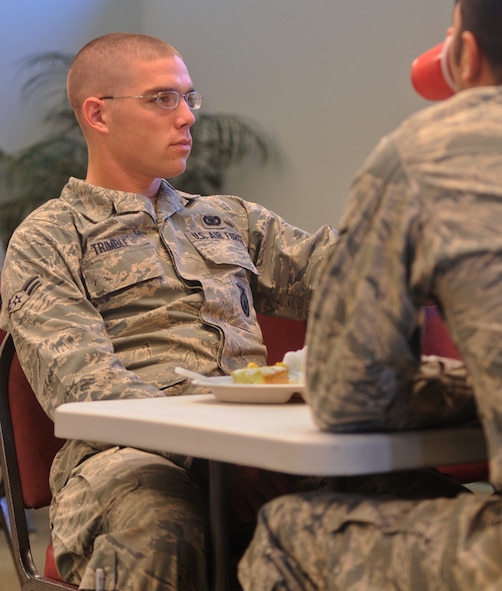 MOODY AIR FORCE BASE, Ga. -- Airman 1st Class Steven Trimble, 823rd Base Defense Squadron fire team member, relaxes after eating his meal at the base chapel Nov. 23. Airmen received a free lunch catered by senior NCOs for Thanksgiving at the Airman's Thanksgiving Luncheon. (U.S. Air Force photo/Airman 1st Class Douglas Ellis)(RELEASED)