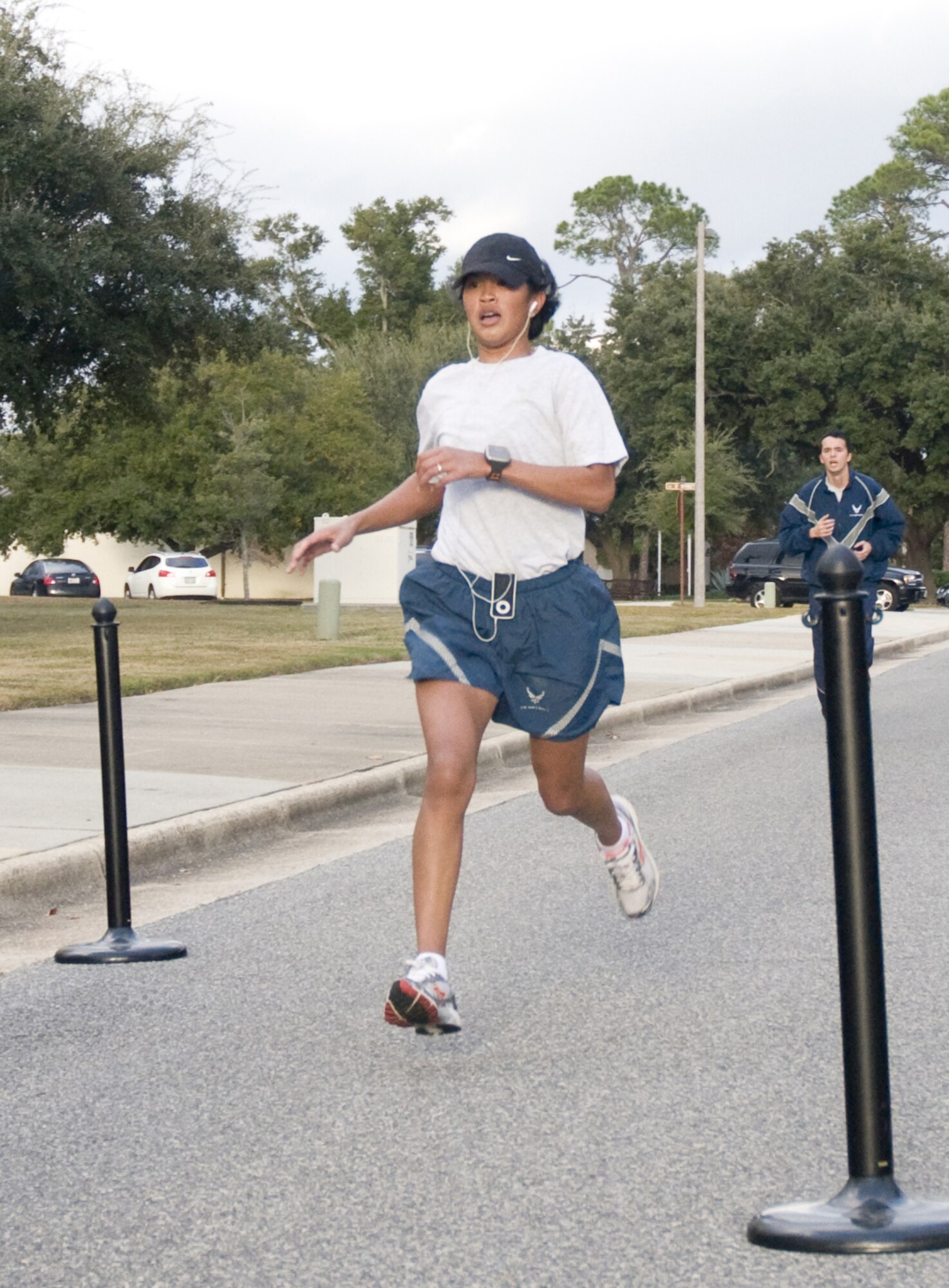 Senior Airman Monik Oubina, 81st Force Support Squadron, was the first female finisher and ninth overall. (U.S. Air Force photo by Adam Bond)