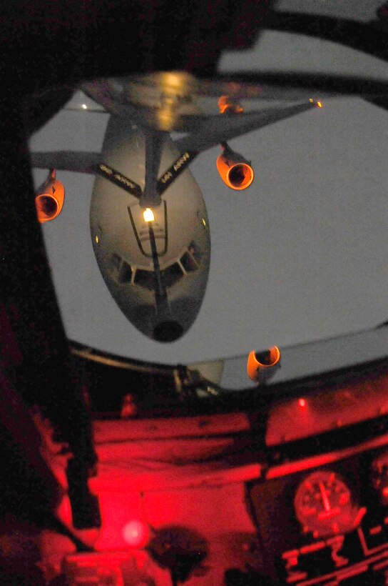 A KC-10 Extender from Travis Air Force Base, Calif., receives fuel from a KC-135 Stratotanker Nov. 18, 2010, over the Pacific Northwest. The KC-135 is from the 92nd Air Refueling Wing at Fairchild AFB, Wash. (U.S. Air Force photo/Airman 1st Class Natasha E. Stannard)