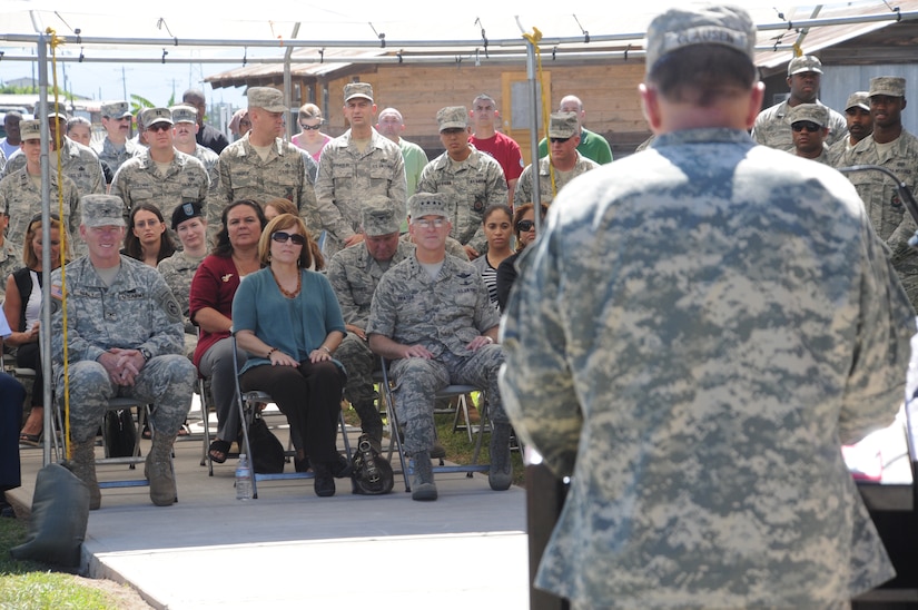 SOTO CANO AIR BASE, Honduras --  Col. Martin Clausen, the Army Support Agency commander, talks about the hard work put into building the new dining facility here during the facility's grand opening ceremony here Nov. 25. The new facility can seat approximately 250 people and has all brand new equipment. (U.S. Air Force photo/Tech. Sgt. Benjamin Rojek)