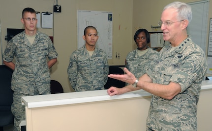 SOTO CANO AIR BASE, Honduras --  Gen. Douglas Fraser, right, the commander of the U.S. Southern Command, chats with members of the Medical Element here Nov. 25. Stopping by different offices on base, General Fraser took time on Thanksgiving to show his appreciation for what Team Bravo is doing in Central America. (U.S. Air Force photo/Tech. Sgt. Benjamin Rojek)