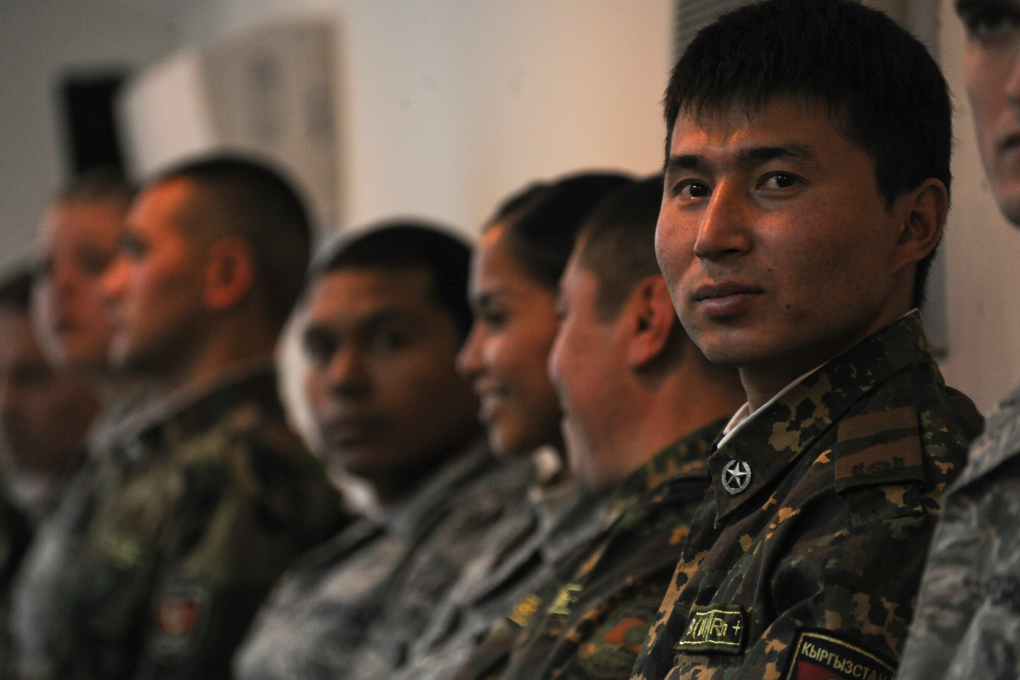 TRANSIT CENTER AT MANAS, Kyrgyzstan - Koi-Tosh Non-Commissioned Officers' Academy visit the Transit Center at Manas for celebration of Thanksgiving Day Nov. 25.  They received a tour of the Center and ate lunch with the troops. (U.S. Air Force photo/Staff Sgt. Nathan Bevier)