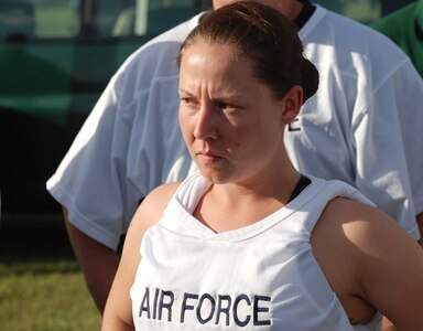 SOTO CANO AIR BASE, Honduras - Staff Sgt. Mindy Hornig, cornerstone of the Soto Cano Air Force flag football team's fearsome A-10 "tank-buster" defense, asseses the vulnerabilities of the opposition before the sixth annual "Turkey Bowl" here Nov. 24.  The base Air Force team defeated the base Army team 30-12. (Air Force photo, Capt. John T. Stamm)