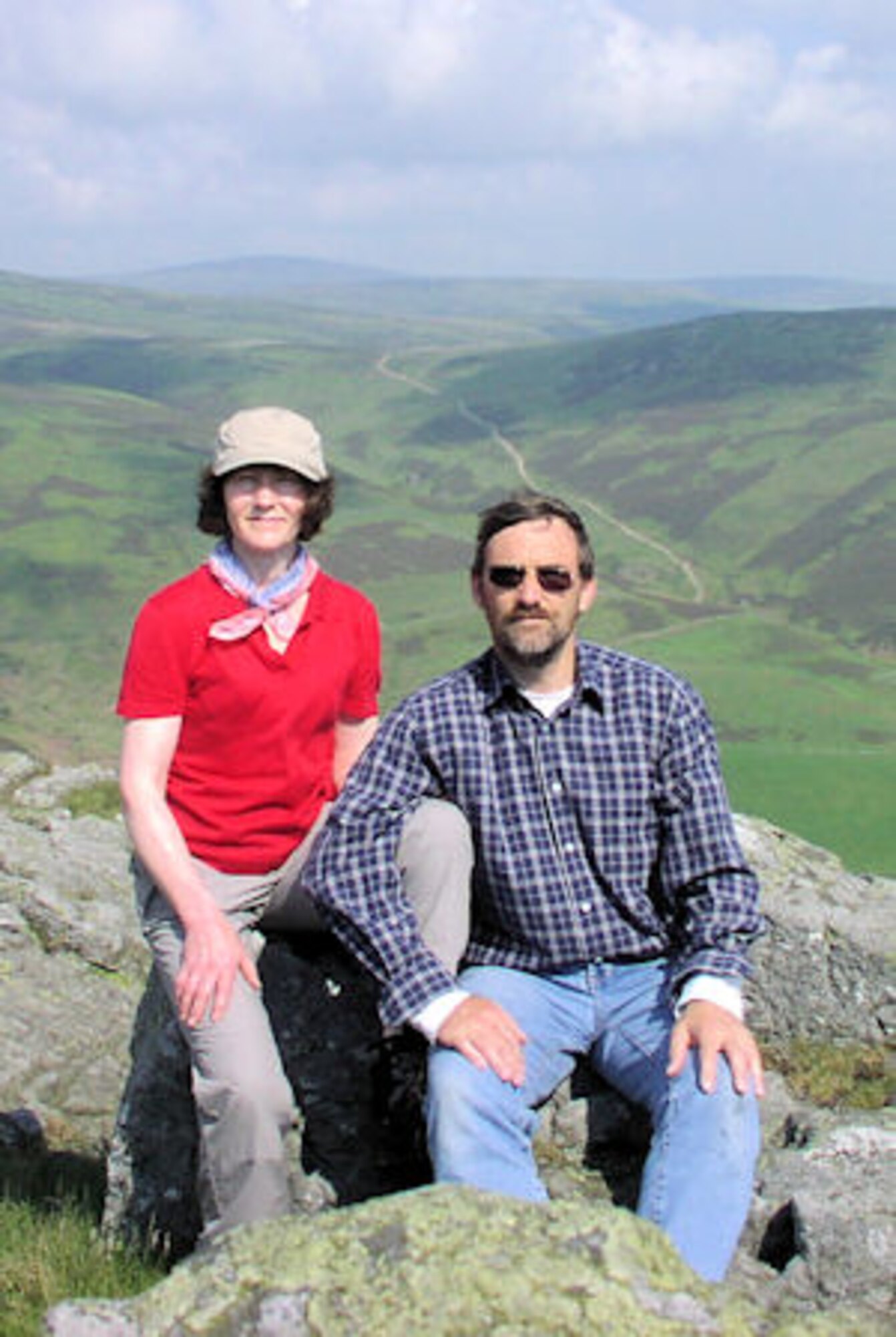 British hikers Carole and Kevin Ryder during a trek of the Cheviot Hills on the English-Scottish border.  It was on a peak similar to the one shown, where Carole Ryder spied a small piece of metal sticking out of the mud.  The object turned out to be the B-17 machine gun which was returned to the JIOCEUR Analytic Center at RAF Molesworth, UK, almost 66 years after it lifted off from a Molesworth runway.  Photo courtesy of Kevin and Carole Ryder.