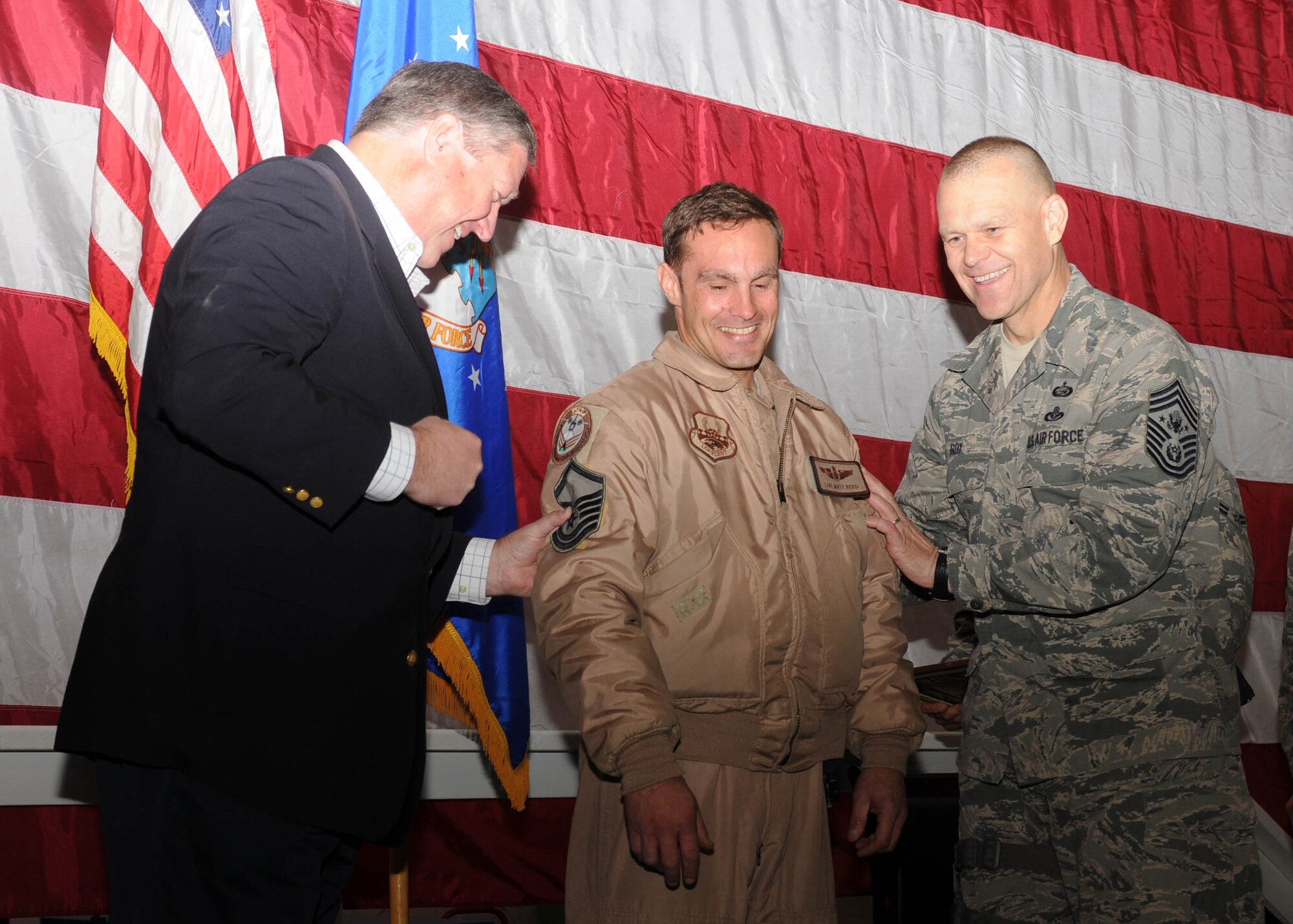 101126-N-6541W-002 Bagram Air Force Base, Afghanistan - Tech. Sgt. Matt Rossi of the 538th Air Expeditionary Advisory Squadron is STEP-promoted by Secretary of the Air Force Michael B. Donley and Chief Mster Sgt. of the Air Force James Roy on Nov. 26. Nov. 26, which is now Rossi's new date of rank, also marks his 14th anniversary in the United States Air Force. (U.S. Navy photo by Mass Communication Specialist 3rd Class Jared Walker/ RELEASED).