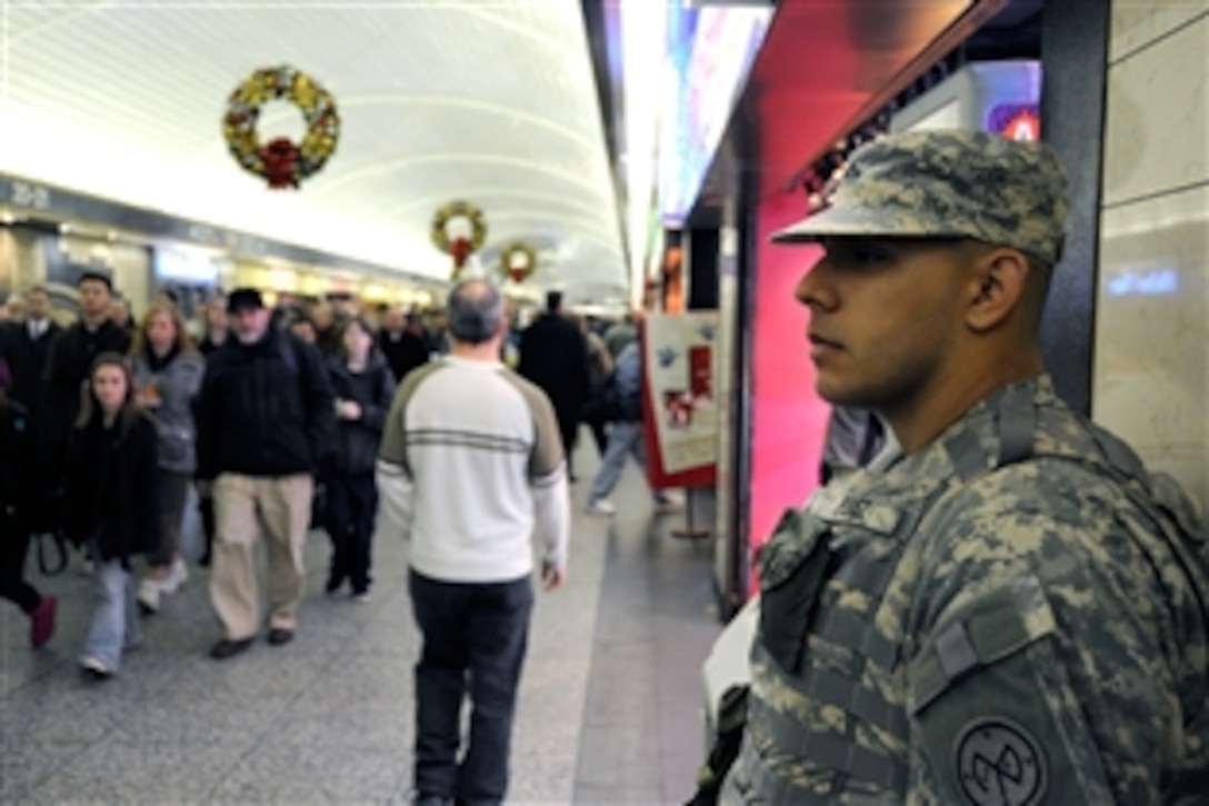 Pvt. Stephen Perez, a New York Army National Guardsman assigned to Joint Task Foce Empire Shield patrols at Penn Station on Nov. 23, 2010. The more than 200 members of the New York National Guard's standing security force in New York City, are working with the New York Police Department, the Port Authority of New York and New Jersey Police and other law enforcement agencies in security arrangements aimed at protecting holiday travelers.

