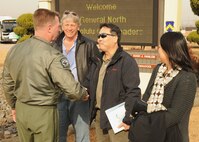 KUNSAN AIR BASE, Republic of Korea -- Col. John Dolan, 8th Fighter Wing commander, greets Kyle Nakamura and Tom Ritchie, guests of the wing as part of a distinguished visitor group that accompanied Gen. Gary North, Pacific Air Forces commander, to various bases within the command during the week. (U.S. Air Force photo/Senior Airman Ciara Wymbs)