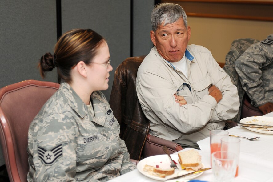 KUNSAN AIR BASE, Republic of Korea -- Mr. Gary J. North, a distinguished visitor, talks with Staff Sgt. Jessica Dierking, 8th Maintenance Squadron, during lunch while at a visit to the base Nov. 22. Mr. North was part of a distinguished visitor group that accompanied Gen. Gary North, Pacific Air Forces commander, to various bases within the command during the week. (U.S. Air Force photo/Staff Sgt. Jonathan Pomeroy)