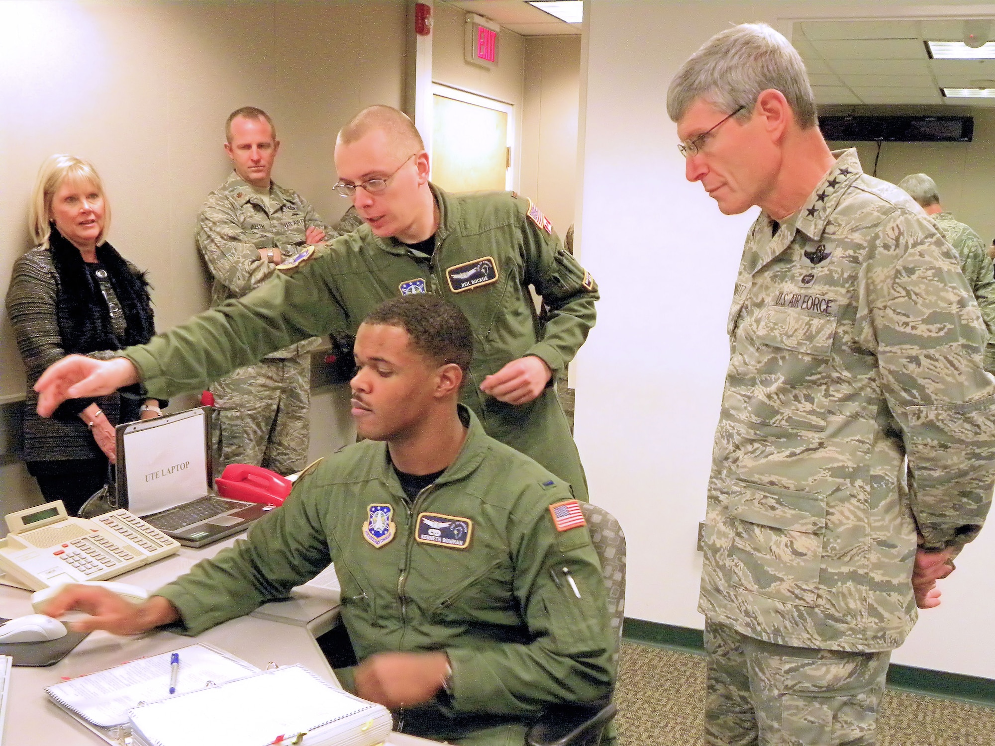Air Force Chief of Staff Gen. Norton Schwartz observes First Lieutenant Kenneth Bowman and Second Lieutenant Neil Bockus of the 12th Space Warning Squadron at Thule Air Base, Greenland, on Nov. 25, 2010, during a Thanksgiving visit.   The 12th SWS is charged with operating, maintaining and securing the Ballistic Missile Early Warning System, which provides for missile warning and space surveillance. (U.S. Air Force photo/ Staff Sgt. Sarah Beasley)