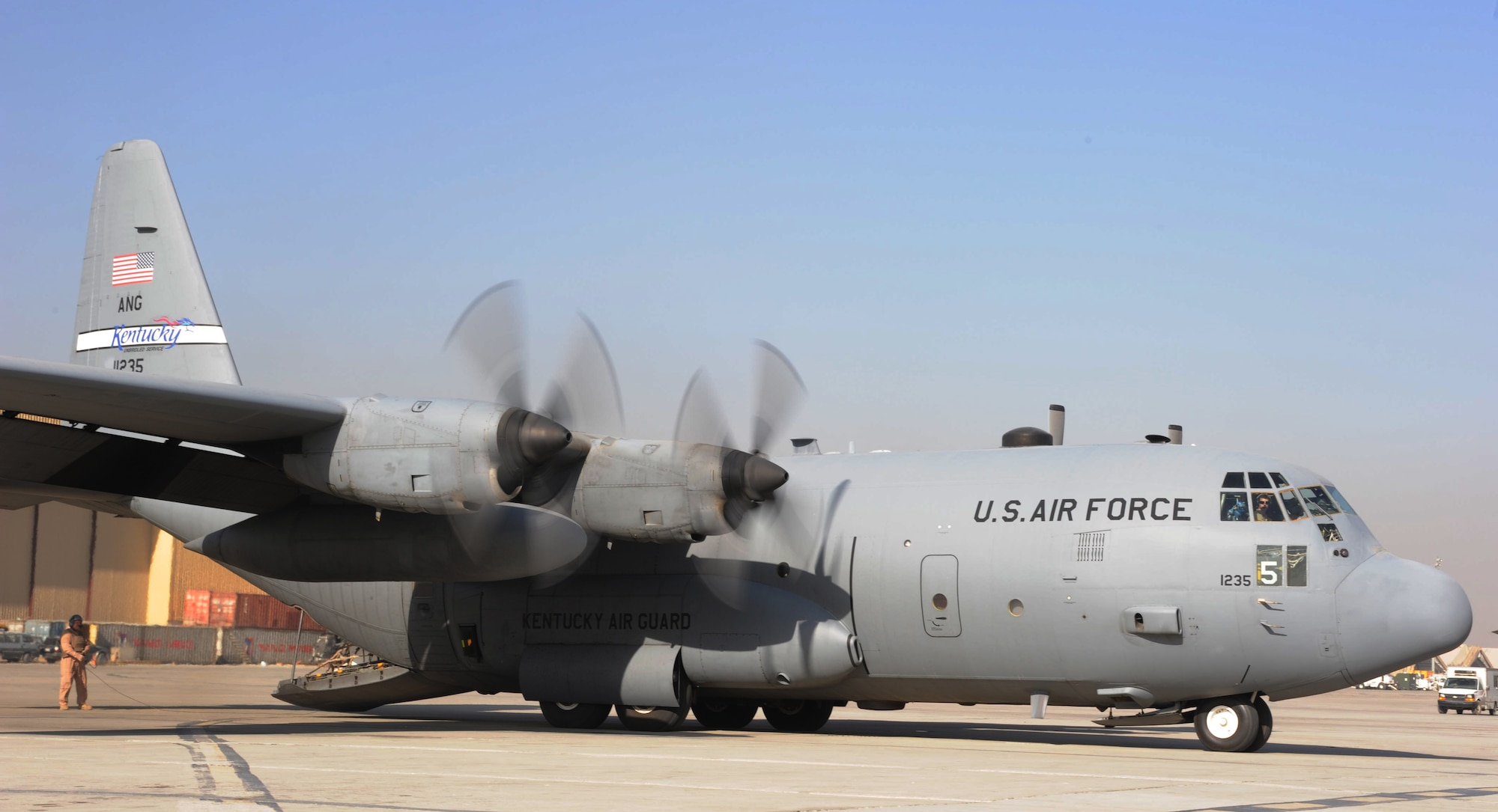 A C-130 assigned to the Kentucky Air National Guard starts engines at Bagram Airfield, Afghanistan, November 29, 2010. (U.S. Air Force photo/Staff Sgt. Christopher Boitz)