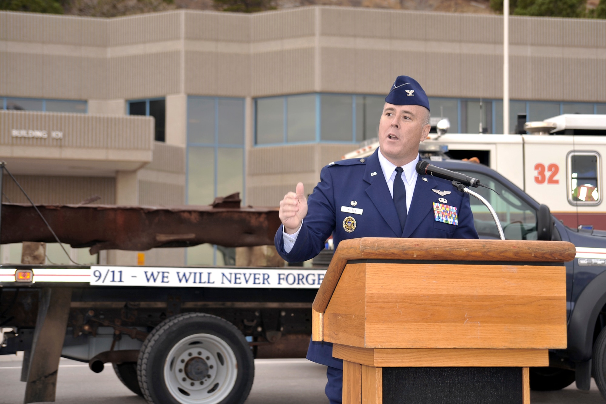 Col. Rusty Wilson thanks the National Homeland Defense Foundation Nov. 19, 2010, for its work in securing a piece of the World Trade Center for a memorial at Cheyenne Mountain Air Force Station, Colo. About 100 servicemembers and civilians gathered for the arrival of the beam, which was released by Port Authority of New York and New Jersey officials to the foundation and then presented to officials at Cheyenne Mountain AFS. Colonel Wilson is the 721st Mission Support Group commander. (U.S. Air Force photo/Larry Hulst)
