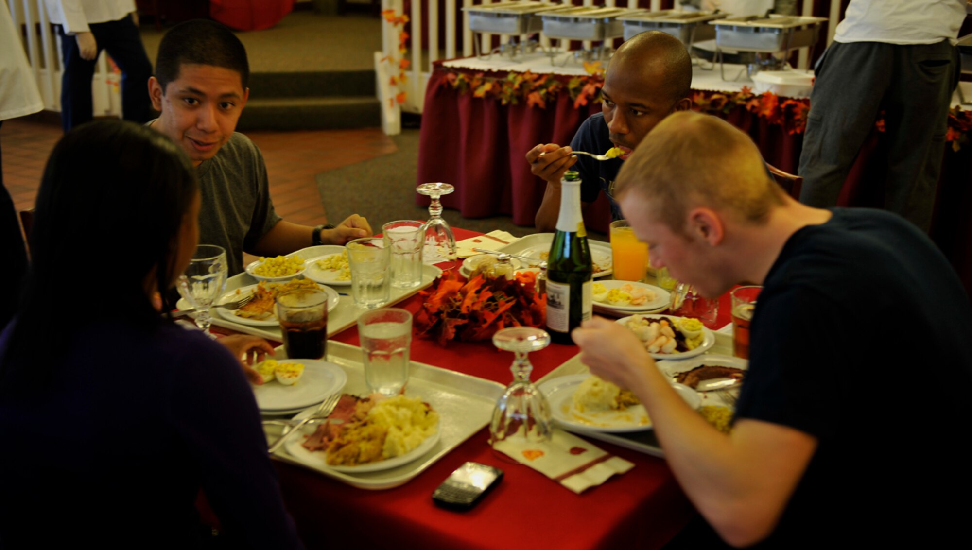 MOODY AIR FORCE BASE, Ga. -- Moody dormitory residents of the dorms at Moody spent their Thanksgiving meal together, eating and sharing stories Nov. 25. Not all members return home for the holidays, so the Georgia Pines Dining Facility is a place where they can share a meal with other Wingmen who don’t go home. (U.S. Air Force photo/Airman 1st Class Nicholas Benroth)(RELEASED)
