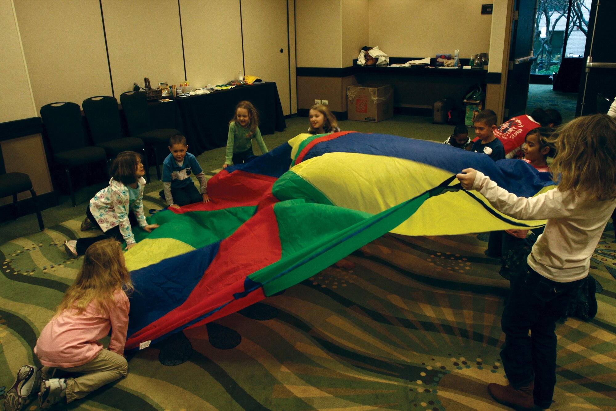WRIGHT-PATTERSON AIR FORCE BASE, Ohio - Children of parents that are either getting ready to deploy or have returned from a deployment, engage in fun activities while their parents attend the various informative sessions offered at the Yellow Ribbon event in Chicago, Ill., Nov. 19-21. The 445th Airlift Airman and Family Readiness office helped coordinate the event.  (U.S. Air Force photo/Senior Airman Mikhail Berlin)